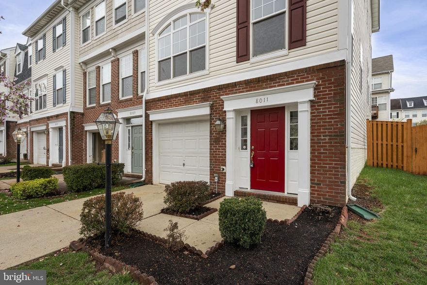 Welcome to this stunning charming end unit townhouse, nestled in the highly desired neighborhood of Blooms Mill. This 3-storey townhouse is located in the heart of Manassas. It offers a modern living with an open floor plan that’s perfect for both everyday comfort and special gatherings.

On the main level, you’ll be greeted with a bright tall deep ceiling foyer and gorgeous hardwood floors that flow throughout. The second level is an open-concept designed with a cozy fireplace and a seamless space connecting the kitchen, dining, and living rooms, creating a perfect space for entertaining on beautiful summer days. Just off the kitchen, step outside onto a huge fenced backyard—ideal for outdoor fun and relaxation.

On the third level, you’ll find a spacious primary bedroom suite featuring a ceiling fan, a large walk-in closet, and a luxurious en suite bathroom. The primary bath offers a spa-like experience with dual vanities, a soaking tub, and a separate shower given a luxury feel of a private retreat.  The two additional bedrooms are connected to a hallway full bath offering plenty of space. The lower level provides a flexible space with a spacious room, which can be used as a home office, gym, media room, or even a 4th bedroom.  Additional features include a one-car garage and a driveway to park other cars.  All brand new stainless steel appliances (April 2025), roof replaced, HVAC replaced (2016).

The entire house is fully renovated with fresh paint, new vinyl flooring, new carpet throughout the entire house, house power washed and gutter cleaned. Every corner of the house offers a ton of natural sunlight.

This community offers plenty of amenities. You’ll enjoy access to a pool with a water slide, a basketball court, a clubhouse, and a scenic pond. Nearby shopping, dining, and entertainment options, combined with ideal easy access to commuting routes, makes this beautifully maintained end unit townhouse the perfect place to call home! Don't miss this incredible opportunity to own this gem!