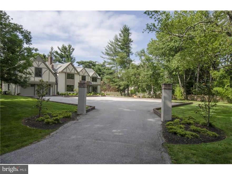 An enchanting tree lined lighted drive leads to this beautiful Clean Line Transitional home that has been almost completely redone and expanded. A grand, brick trimmed courtyard welcomes you to a charming post and beam front porch with a copper roof.  Enter into a transverse center hall which is flanked by a charming Office/Living Room featuring custom sliding doors, and a Great Room with a fireplace custom cabinetry, wet bar area with built-in wine storage, and an adjoining breakfast room that completely opens to an extraordinary kitchen adjacent to the Dining Room. A mudroom, featuring garage and backyard entrances, with custom cubbies, desk, and quartzite floors, and a formal powder room complete the 1st floor. There are 5 architecturally extraordinary Bedrooms including 2 masters; the new master has custom built-ins, a fireplace, a Juliet balcony and 2 walk-in closets. The main master bath enjoys radiant heating, dual vanities and Carrara marble. The 3 additional baths are en suite. A very spacious laundry room with wonderful details complete the 2nd floor. The Lower Level is finished with a Game Room, a Gym/wine room, and a Powder Room.  This Exquisite home is ideally located in the estate area of Haverford, is a short distance to the Merion Golf Club and is located just minutes from highly respected schools and all that Philadelphia and the Main Line area has to offer.