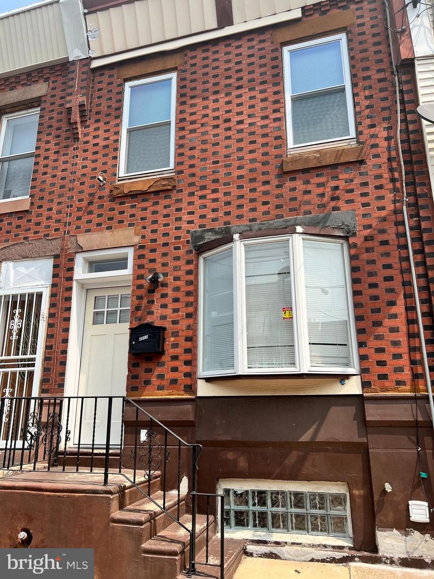 Located in the popular Point Breeze neighborhood, this surprisingly spacious townhome was completely renovated in 2019.  Melding original character with modern amenities, this residence would make a perfect starter home or investment property.  The restored front facade features original, bi-color Philadelphia clay bricks laid in a traditional Flemish bond pattern.  Upon entering, the first things you will notice are the expanse of gleaming hardwood flooring and the original exposed brick wall along the entire left side of the home which provide both character and a sense of luxury.  The southern exposure floods the space with natural light while the open, extended floor plan provides plenty of room for living and dining areas, new half bath, and kitchen on this level.  The star of the show is the enormous, well-appointed dream kitchen featuring copious white cabinetry, SS appliances, expansive quartz counters and gas cooking, perfect for entertaining!  There is also easy access from the kitchen to the large rear yard which provides plenty of space for BBQ, alfresco dining and gardening.  Recessed lighting and a large pantry / coat closet complete this level.  The stairs to the 2nd floor retain the original wrought iron railing mounted on a rough hewn, wooden tread floating staircase with loads of charm.  Upstairs you will find 3 bedrooms and a completely renovated hall bath with tub/shower featuring neutral, yet striking white subway tile.  All bedrooms have ceiling fans and ample closet space.  There is even a large linen closet and extra storage closet in the hallway.  Finally, head down to the partially finished basement with recessed lighting, tile flooring, all newer mechanicals and laundry area.  Use this clean, dry space as extra storage, a play room, an exercise area, office, or workshop.  Easy access to I-76 makes for an easy commute to Center City, the sports complex or NJ.  Move-in ready! Don't miss this one!