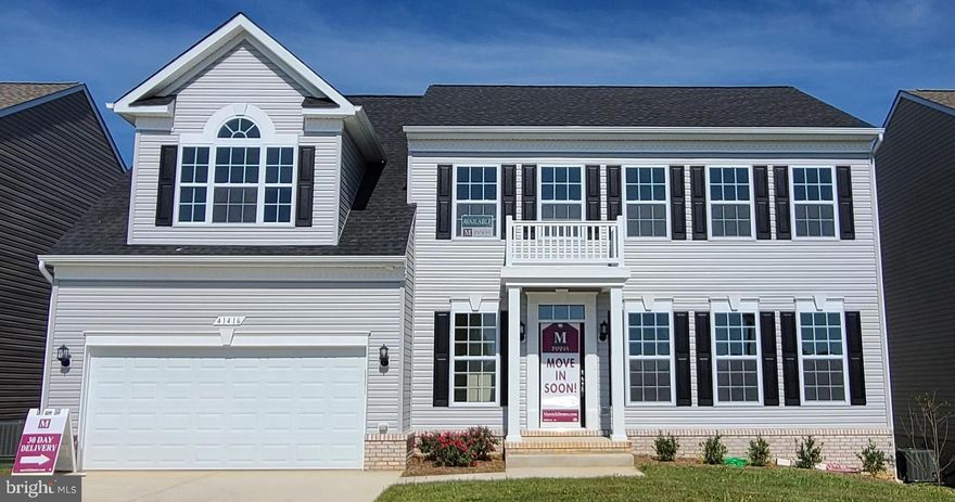 Sold & Settled Grandhaven #1 with portico at the Clarks Rest neighborhood in Leonardtown by Marrick Homes. This home features 4 upper bedrooms and 2.5 baths on a homesite that has a nice flat backyard that has the potential to fence in. The layout of this Grandhaven features the very popular slid kitchen layout which includes an extended kitchen with a large walk in pantry, oversized kitchen island, butlers pantry, desk area and cosmetic upgrades such as quartz kitchen counters, upgraded white cabinets w. hardware,  stainless steel appliances consisting of double ovens, a microwave hood vented to the exterior, as well as electric cooktop and dishwasher,  plus some additional recessed & pendant lighting overhead. Just off of the Kitchen is a breakfast nook area and family room, with a mudroom area off of the garage area, as well as a formal dining room ion the 1st floor.  Flooring throughout most of the first floor will be vinyl plank flooring, with upgraded carpet and padding in the family room. For the 2nd floor, there is a 2nd floor laundry room included with a linen closet, an extended hall bath with double vanities that also includes linen closet and has ceramic flooring installed. Bedrooms will all feature ceiling fan pre-wires and upgraded carpet and pad with the owners suite including a large walk in closet as well as sitting room area at the front. Owners bath includes an oversized 5x5 shower with dual shower heads, a large soaking tub, plus a double vanity,  with upgraded ceramic floors and surrounds for the shower and tub areas. Basement is unfinished but does include a sliding glass door with a 10x12 concrete patio in the rear, a 3pc bath rough in, plus 2 full size windows, with one placed inside the typical den area, which could later be turned into a bedroom.  A 12'x12' composite deck at the rear of the kitchen is also included


Clarks Rest community features community pool, playground, basketball court, tennis courts, sidewalks and community clubhouse which can be rented out for private events. Location of this home to these amenities are less than 50 yards to walk to!