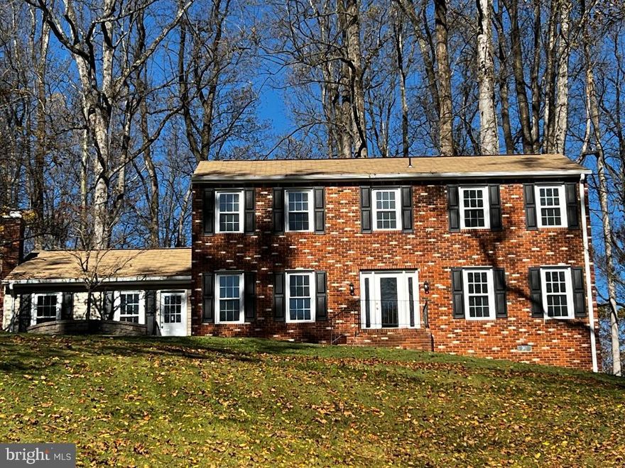 Welcome to this very private and secluded Colonial home located in walking distance to the Port Tobacco Marina and Restaurant. The home features 5 bedrooms and 3 full baths with one of each on the first floor. The Kitchen, with a breakfast bar, was just renovated 2 years ago.  The Family room has a woodburning fireplace that was just inspected and repairs were made. It also comes with a warranty if cleaned every year. The roof is 12 years old and comes with a warranty. The whole house has new flooring and was freshly painted. The water heater is new as well. Enjoy family time sitting around your brick firepit, located on your brick patio, with a country setting. You can also enjoy time in the screened porch off the back of the home. For the mechanic in the family, the detached 30X40 detached garage has electric. A Home Warranty and a 50" Zero Turn Cub Cadet mower will also convey with the purchase.