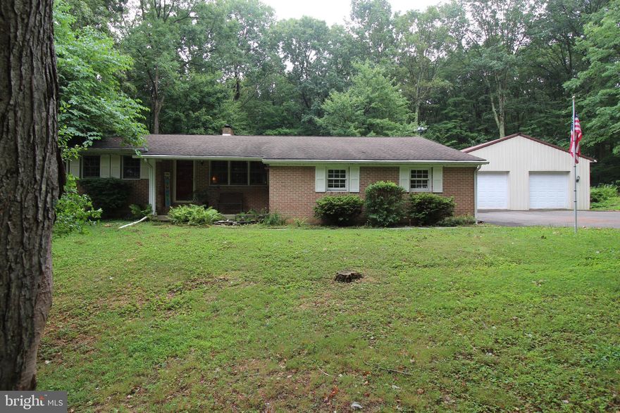 Peace and tranquility await you in this 3 bedroom, 2 1/2 bathroom ranch in Lehighton. Ample space and storage will allow you to keep your toys secure and let your hobbies flourish. There is a large 30' by 40' barn with double doors to work out of along with a shed to keep the lawn tools. Going inside there are vaulted ceilings in the living room and redone hardwood floors in the dining area. There are two bedrooms and a full bath on one side of the home and on the other there is the primary bedroom with en suite. Downstairs you have the rec room with hand built bar along with a half bath for all of your entertaining needs. There is a 16' by 16' storage area to complete the lower level.