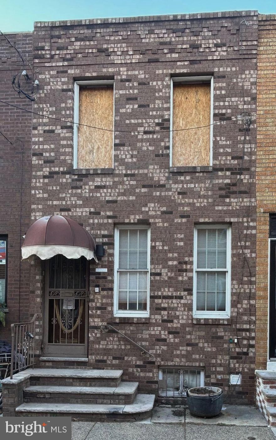 Home is being sold as-is and requires a full renovation, but the upside is in the location: a highly desirable neighborhood close to the Broad Street Line, shops, dining, and commuter access. A rare chance to reimagine the space and create your own finished product in a strong area.