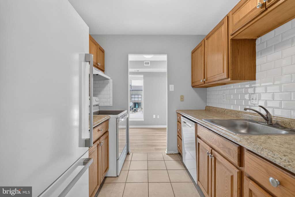 Photo of 7589 Margate Ct #1C 103, MANASSAS, VA 20109 (MLS # VAPW2126818)