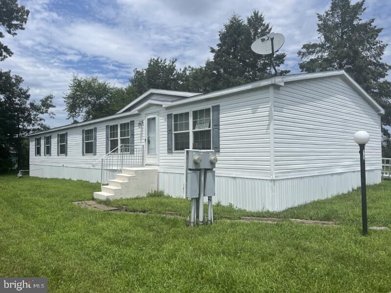 This 4 bed, 2 bath home sits on a large corner lot and offers many upgrades including new carpet throughout, stainless steel appliances, fireplace in family room, separate office space with built-in cabinets and much more! The community offers off street parking and the home is wheelchair assessable with a ramp at the rear of the home. This property is priced to sell and won’t last long!