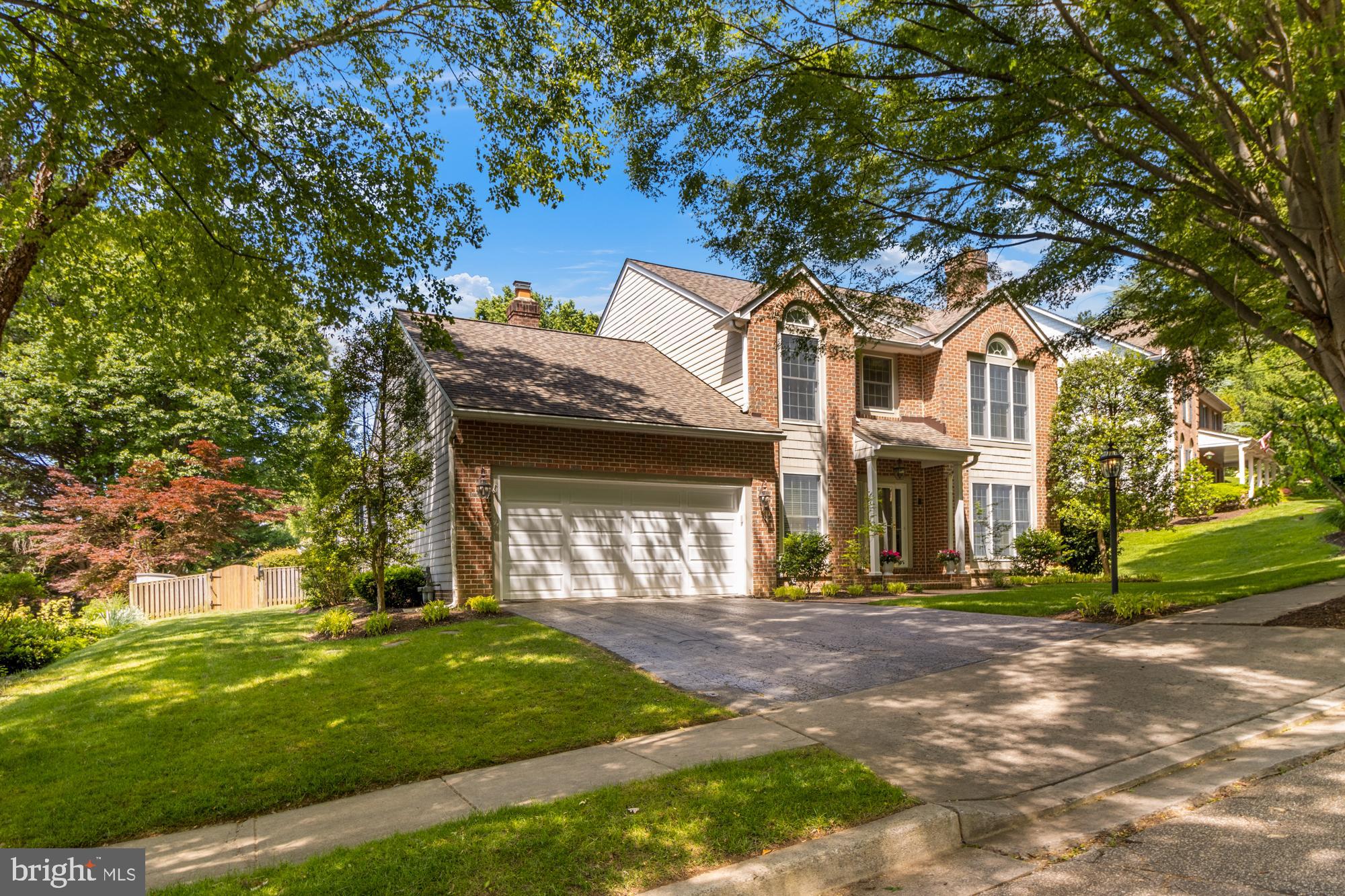 A home designed for how you really live! It all centers around the family room, with its french door access to the wrap around porch, yard and pool. It's big living with a cozy vibe courtesy of the hardwood floors, fireplace and built-ins. The knockout kitchen overlooks it all, and features a two drawer refrigerated beverage station, miles of counter space and a serving buffet. It's a step away into the spacious mudroom and laundry (and there's a 2nd laundry option on the upper level!) and first floor office. There is a primary suite on both the first and second level, each with gorgeous new spa-like baths, and just wait until you see the closet space!  The upstairs hall bath has been fully renovated with high-end materials too, and serves the other 3 spacious bedrooms. There's a large but cozy additional family room on the first floor, plus a finished basement with full bath, rec-room space and a large private room - it's just made for a workout space or additional office. You'll enjoy the pool wet or dry! With multiple patio areas you can sit and take in the view... there's no need for endless yardwork, since it's attractively landscaped with low maintenance perennials. You'll find more green space along the side yard, too. Updates include a new roof of premium fiberglass shingles with a transferable warranty in 2019, a new main level heat pump in 2024, new main level washer and dryer in 2022,  gas lines and fireplace inserts were installed in the living and family rooms in 2020, and oodles of other items! Your agent can download the full list.