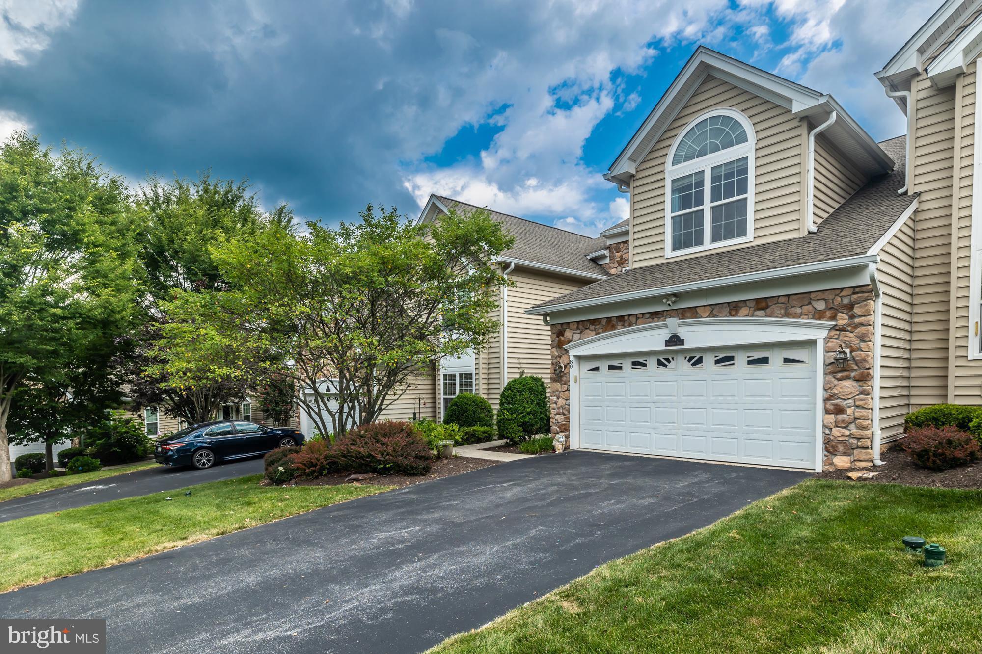 Peace of Mind with a New Roof (2023) in Charlestown Meadows!
Welcome to 88 Sagewood Drive, a spacious 3-bedroom, 2.5-bath Toll Brothers townhome in the desirable community of Malvern. With over 4,100 square feet of finished living space and thoughtful updates, this home blends comfort, convenience, and value.
Inside, you’re greeted by hardwood floors, a formal dining room with tray ceiling and wainscoting, and a dramatic two-story living room filled with natural light. The gourmet kitchen features granite counters, abundant cherry cabinetry with under-cabinet lighting, a walk-in pantry, and an adjoining breakfast nook. The kitchen opens seamlessly to a cozy family room with a gas fireplace and direct access to the back deck—perfect for everyday living and entertaining.
Upstairs, the primary suite offers vaulted ceilings, two walk-in closets, and a spa-like bath with dual vanities, soaking tub, and separate shower. Two additional bedrooms share a hall bath with double sinks, while the third-floor loft is ideal for a home office, studio, or playroom.
The finished basement provides exceptional versatility with space for a media room, gym, or game area. Outside, the deck overlooks a peaceful green space—ideal for relaxing afternoons. And with the roof just replaced in 2023 by the HOA, major maintenance is already handled.
Charlestown Meadows residents enjoy a low-maintenance lifestyle with exterior care, snow removal, and trash included. The community offers resort-style amenities including a clubhouse, pool, fitness center, tennis courts, and scenic walking trails—all within the Great Valley School District and minutes to major highways, shopping, and dining.