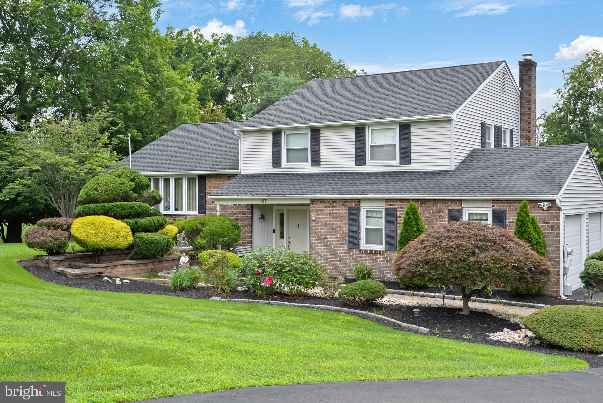 Welcome to Churchville Manor in Northampton Township. Conveniently located in the award-winning Council Rock School District. This 4 bedroom, 2 and half bath home offers abundant possibilities for hobbyists. Enjoy gardening, use the spacious two-car garage/workshop, relax on the covered porch, or entertain guests on the deck. Upon entering the large vestibule on the main level, you are greeted by a comfortable family area featuring a brick fireplace and sliding doors opening to the outdoors. This level also includes a conveniently located laundry room and half bathroom. A separate bonus room—currently utilized as an office—may serve equally well as a fourth bedroom.
The core living spaces are found one level above, where the living room, dining room, and kitchen form an inviting setting enhanced by neutral decor. Sliding doors from the kitchen provide easy access to outdoor dining. Notable recent upgrades include a five-year-old roof and a brand new AC system. Additional features such as ceiling fans and tile flooring contribute to both comfort and ease of maintenance. The upper level consists of three bedrooms and two full bathrooms, with the primary bedroom offering the bathroom ensuite.
The finished lower level provides ample space for storage, a workshop, or further customization to suit individual needs. Set in a tranquil neighborhood, this home is ready for your personal touch. Churchville Manor is just 15 minutes from Newtown and only 25 minutes to I-95, ensuring convenient access to metropolitan areas. Interior photos will be published as soon as possible. NOTE: The amount of square footage does not include now-finished areas. All buyers are encouraged to measure for their own furniture and use assessments.