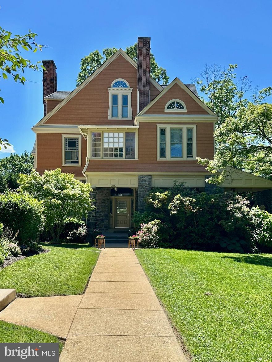 Don’t miss this rare opportunity to own this beautifully appointed 3 bedroom, 3 bathroom 2,566 sq ft jewel box of a condominium with 4 fireplaces, that was once a church rectory.  The former rectory had a pedigree, which remains today, and was entirely renovated and thoughtfully redesigned in 2015 into a 12-condominium community, known as Narberth Place. The developer retained the original, ecclesiastical architectural details and integrity, while transforming the interior with every stunning modern touch, as a new house, inside an old house, in Narberth!  A private driveway along with a two-car garage completely alleviates any parking issues, and 206 Price is just steps away from all the very best amenities - community, shops, bars, train service and restaurants - that makes the heart of Narberth so special.
This is a sophisticated and unique offering.  Enter from a shared garden and entirely rebuilt and vaulted covered, stone front porch, that offers three+ seasons of easy outdoor living. Portico from the covered porch enters through a grand 2-story foyer, warmed by an original, restored fireplace and accented by the original transverse staircase and pretty, bright window. The foyer chandelier is one of the original sanctuary lights from the adjacent sanctuary that was also part of this conversion project. Everything in the condo is new construction c 2015 with the charming exception of the updated, heated solarium and original sleeping porch that still retains its bright, original allure. From the gleaming new hardwood flooring and the soaring, coffered ceilings, to the great, updated and organized closet spaces, this property is sure to please even the most discerning buyer.
This home has a seamless flow with all over-sized Jeld Wen windows throughout, and louvered shutters inside, that allow for ample amounts of natural light. The extensive renovation has been  meticulously constructed to replicatethe building’s original window design for architectural integrity and continuity. 206 Price is an entertainers delight with a state-of-the-art kitchen as the heart of the open floor plan with easy flow to the large dining room and to the grand living room with a 12 foot corbelled ceiling and its own fireplace. The kitchen features Craft-Maid maple cabinets, a 2-tier center island with bar seating, an abundance of prep and storage space, stainless steel appliances, gas cooking, modern, black granite countertops, pantry, tile backsplash, and more. The owner's bedroom has an original, iron fireplace and built-in bookshelves, along with bright, oversized windows and opens to a dressing room with dual closets, and an oversized, luxe bathroom. This bath offers a quartz topped double bowl vanity, oversized tile shower with frameless glass door, and a deep, freestanding soaking tub. The first guest bedroom with two closets features its own small double entry for privacy and an en suite luxe full bath. The second guest bedroom with a double closet is privately located at the opposite end of the condo with its own converted original fireplace and private access to the full hall bath.  The recessed foyer has a full laundry closet, a oversized utility closet, and a back door to rear steps down and out to your garage.  The back steps access the basement, which has a very large and secure storage space for this unit, all located in the award-winning Lower Merion School District.
Please come to see this exciting new listing for yourself - the best that Narberth has to offer, a tastefully updated unit in the very best location, in excellent 'move-in' condition with first class amenities.