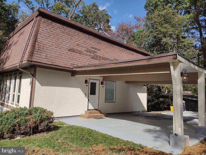 Back on the market! Installed a new rear fence, new flooring on 1st Floor. Shows fantastic, just bring your bags and move in! Seller will help with some closing costs! This is the Rock Creek Park of Fort Washington MD. If quiet and peaceful is what you're looking for this is it. Contemporary home total 2,650 sq. ft., move in condition. Master bedroom with wood burning fireplace, nice in suite bath. Three stories of living space. Updated kitchen with quartz counters, stainless appliances, 2nd fireplace in living room. Huge deck off 1st floor, leading to large patio and finished lower level with walk out to patio. Large carport.  5 bedrooms, 3 full baths, updated baths, new floors. The property comes with deeded access to Potomac, great if you have a boat!