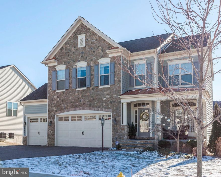 Outstanding 3 Car Garage and Plenty of Storage!! 4 BDRMS/3.5 Baths. Wood floors on main level. Kitchen includes stainless appliances, double ovens, granite counters, island and breakfast bar. Family room off kitchen. Formal living and dining rooms. Large master bedroom suite. Well sized LL rec room with rough in for bath, and storage room that could be your future media room.