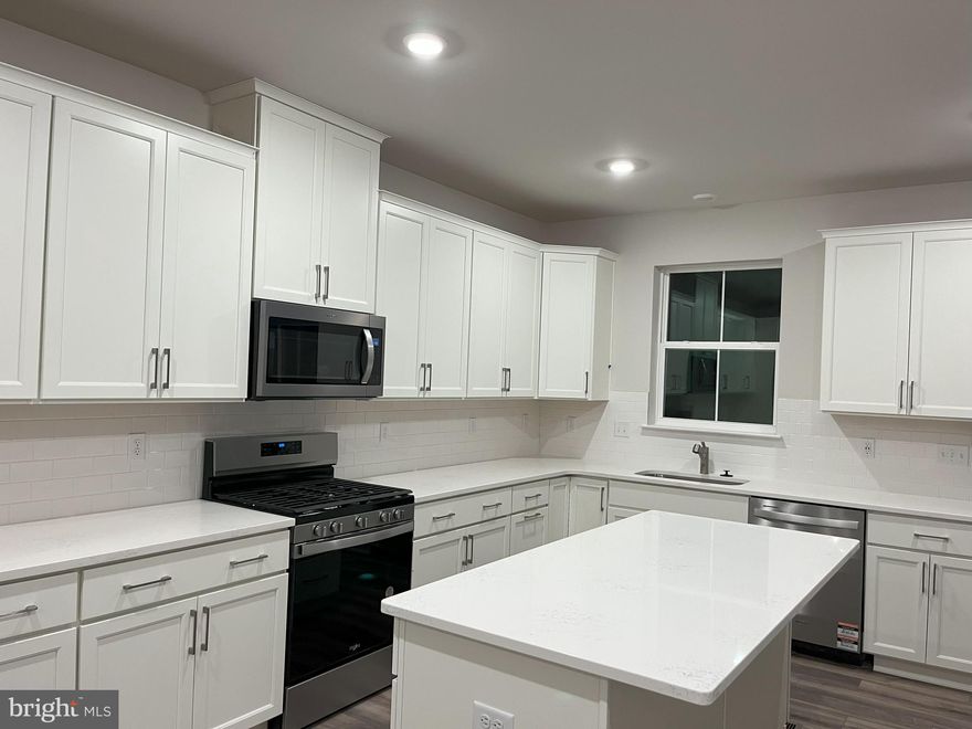 Be the first to live in this brand-new luxury Cambridge model townhome at River Pointe, offering the perfect combination of modern design, comfort, and convenience. The entry level features a spacious two-car garage and a versatile flex room ideal for a home office, gym, or media space. The open-concept main level boasts a gourmet kitchen with quartz countertops, a large island, and ample cabinetry that flows seamlessly into the bright dining and living areas with a convenient powder room. Upstairs, the primary suite offers a walk-in closet and a spa-inspired bath with dual sinks and a subway-tiled shower, while two additional bedrooms, a full hall bath, and an upper-level laundry area provide everyday ease. The home also includes a high-efficiency tankless water heater, ensuring endless hot water and lower energy costs. Conveniently located near the train station (approximately 1 mile away) and major routes including 23 and 202, this home offers quick access to King of Prussia, Conshohocken, Wayne, Malvern, Chesterbrook, Collegeville, and Philadelphia. Enjoy nearby shopping, dining, and entertainment at King of Prussia Mall, Valley Forge National Park, and Valley Forge Casino—making this luxury rental home the perfect mix of style, comfort, and location.  Schedule your tour today for this rental unit.