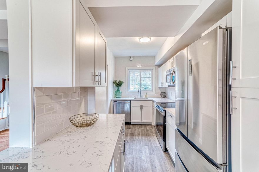 This gorgeous, sunny end-unit in the desirable ParkFairfax community has been renovated from top to bottom and is a MUST SEE!  The gourmet kitchen includes brand new cabinets, quartz countertops, a subway tile backsplash, and top of the line Samsung appliances (The wrong range was delivered initially but  has been updated to a gas unit since the photos were taken!).  The kitchen opens to the sizable dining area and large living room, both full of windows and lots of natural light!  The full bath has also been updated with white subway tile, a modern vanity, and new flooring.  All hardwood floors have been refinished throughout and every wall has a fresh coat of neutral paint.  The large, sun filled primary bedroom includes a sizable closet.  The second bedroom can also serve as an office, perfect for working from home!  A washer and dryer have been added to the unit.   Attention has been paid to every detail throughout the beautiful home, which backs to trees and plenty of green space, perfect for relaxing on a beautiful day!   The amenity filled ParkFairfax community includes an outdoor pool, tennis and basketball courts, recreation areas, tot lots, and green space throughout.  Perfectly situated less than 1/2 mile from I-395, this location is ideal for commuters headed into Arlington, the Pentagon, or Washington, DC.  ParkFairfax is also just minutes from the Village at Shirlington, full of restaurants and shops as well as an Arlington Transit (ART) bus station.