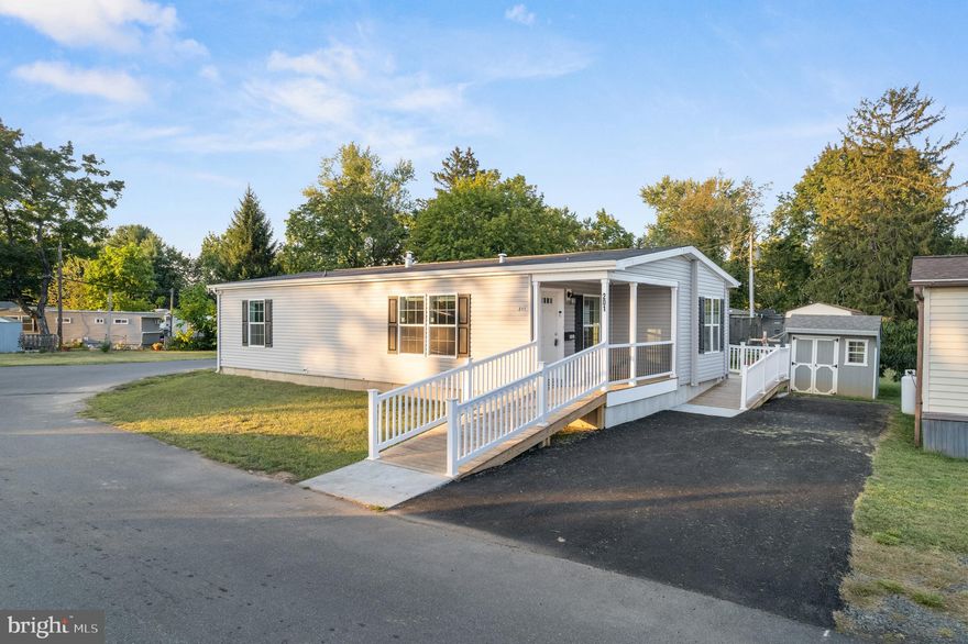 Fantastic almost new double-wide home with luxury upgrades!!!  It was built in March 2025 One floor living at its best.
This amazing home was custom-built for the previous owner. It features handicap access from the front entrance all the way through the home, including the rear exit door with a ramp.
The first floor features a huge eat-in kitchen with stylish cabinets, stainless steel appliances, refrigerator, ample counter space and a very convenient island.  It also features a bright and cheery eat-in area that's the perfect place for your breakfast and a morning cup of Joe.
Adjacent to the kitchen is a large living room /dining room. The entire home is planned to be handicap accessible with wide hallways and doorways.
The oversized master bedroom features a large master bath with a walk-in shower and large closet. The second bedroom is ample size.
Additionally, the home has a full hall bath with a tub/shower.
The entire home features luxury vinyl planking.
There is a large storage shed for all your tools and lawn equipment.
Hurry out and make this home yours for the holidays.