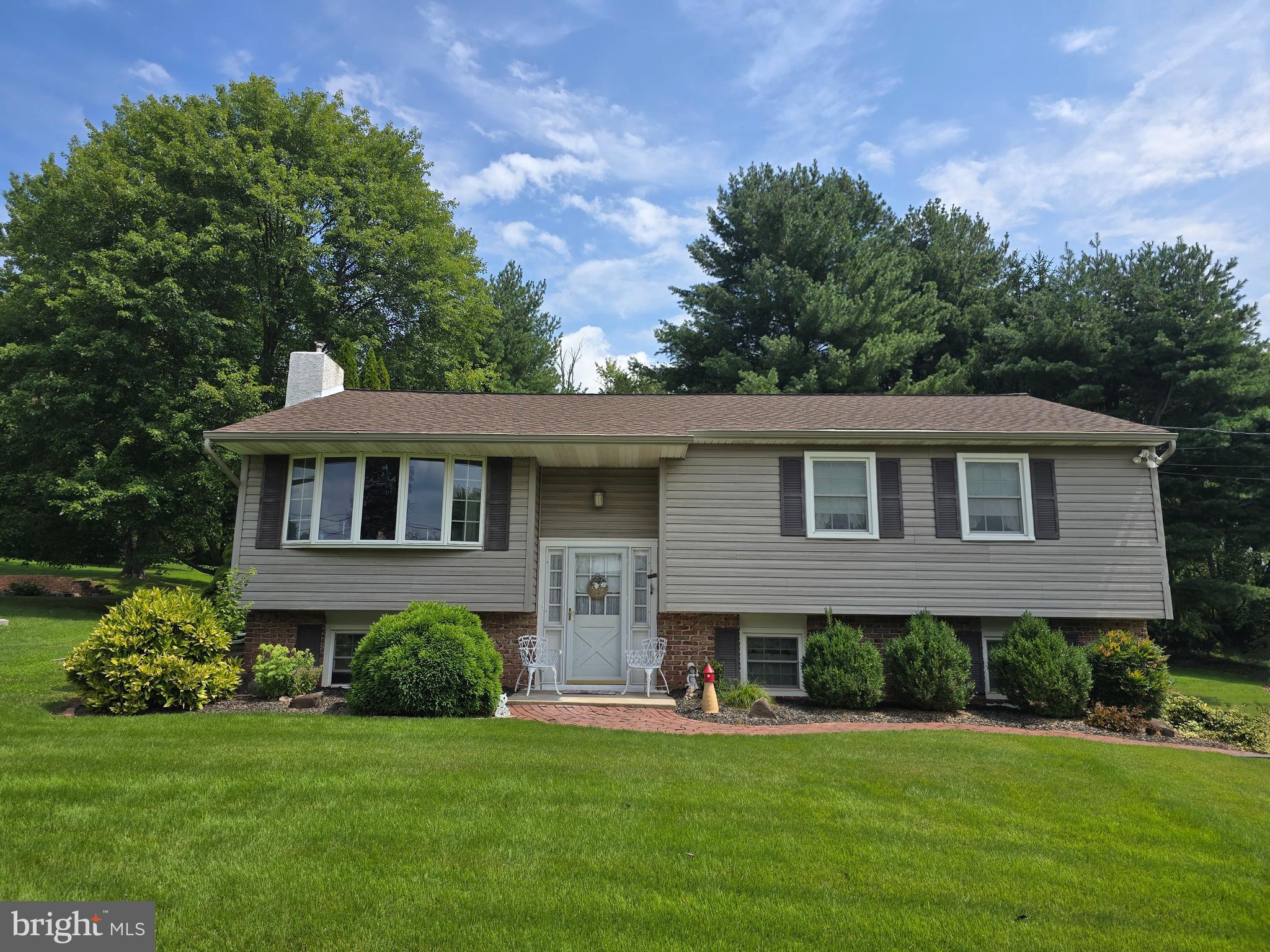 This quaint bi level located in North Coventry is ready for its new owners. As you drive up the driveway you notice the mature landscaping. Make your way inside and upstairs to the living room beaming with natural light from the bow window. There are functioning exposed beams running from the living room through the dining room adding to the charter of the home. The eat in kitchen has original wood cabinets, dishwasher, electric stove and refrigerator. Walk down the hallway to the full bathroom with double vanity and tub surround shower. The 3 bedrooms all have closets and hardwood flooring flowing throughout. The lower level has a family room with a pellet stove, wanes coating and laminate flooring. The bathroom/Laundry area has a washer, dryer, wash sink, toilet and a shower stall. The 2 car garage finishes up this adorable home.
Schedule your tour today!