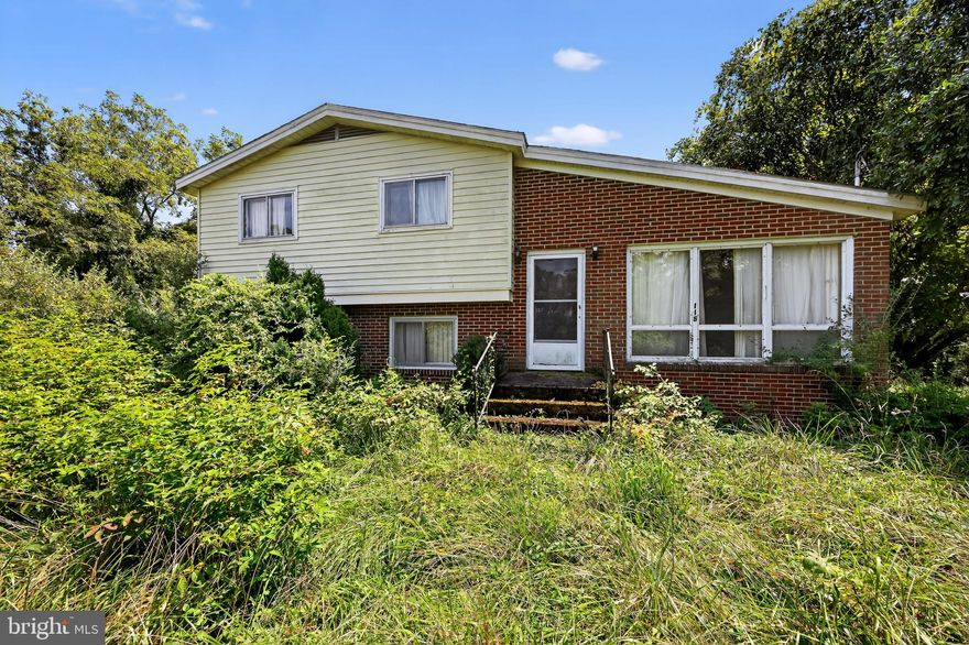 For Sale As-Is (Appointment is required)
Two houses on 1.85 acres 
Beautiful view overlooking high elevations
Main house: 3 bed / 1.5 bath, 1634 sqft

Second dwelling:
The second little house is a 2-bedroom, 1-bath. It's a simple structure with a center block foundation and a full, walk-through open basement. Both houses share the same well but have separate septic systems. Second house: 2 bed / 1 bath, full walkout basement