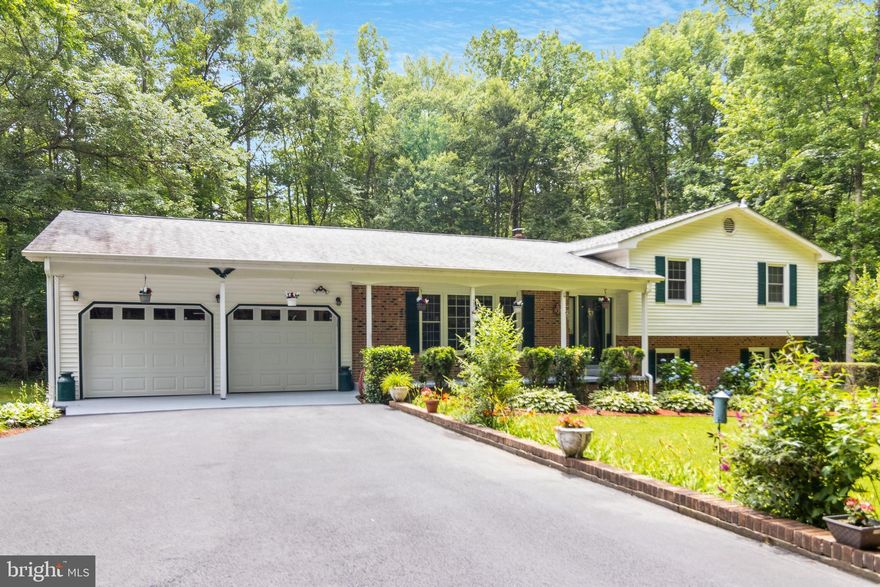 Welcome to this well-maintained split-level home nestled on a serene 3.5-acre wooded lot in the sought-after Woodhaven neighborhood in La Plata. Boasting 3 bedrooms, 2.5 bathrooms, and generous living spaces, this property offers a perfect blend of comfort, privacy, and natural beauty.

Upon entry, you are greeted by a spacious living room featuring large windows that bathe the room in natural light. The adjoining dining area seamlessly flows into the modern kitchen, complete with stainless steel appliances. Step outside onto the expansive deck overlooking the private backyard, ideal for alfresco dining or enjoying morning coffee while taking in the picturesque views of the surrounding landscape. 

The upper level houses the tranquil primary suite, which includes a private en-suite bathroom. Two additional bedrooms, and a full-size bathroom with a tub/shower combination.

The lower level provides the family room with a fireplace, perfect for relaxation or entertaining guests. A convenient half bathroom and a separate laundry room add to the functionality of this level.

Located just minutes away from shopping, groceries, and restaurants, this home offers the perfect balance of tranquility and convenience with easy access to DC, and Virginia.

Don't miss the opportunity to own this charming split-level home on 3.5 acres of prime real estate. Schedule your private showing today and envision the lifestyle this property has to offer!