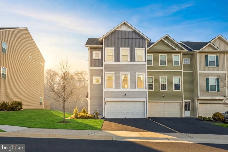 Nestled in the desirable Snowden Bridge community, this amazing townhome has a private backyard with tree views! Built in 2019, this well-maintained end-unit townhouse offers nearly 2,745 sq.ft. and 3 bedrooms + 3 full and 1 half bathrooms. 

As you enter, you are greeted by a warm and welcoming ambiance, enhanced by plush carpeting and elegant recessed lighting throughout. The heart of the home features a thoughtfully designed combination kitchen and living area, perfect for both entertaining and everyday living. The gourmet kitchen is a chef's dream, equipped with stainless steel appliances, a gas oven/range, and a spacious island that invites culinary creativity. The adjoining family room, bathed in natural light, creates a seamless flow for gatherings and relaxation. 

Retreat to the luxurious primary suite, complete with two generous walk-in closets and a spa-like bathroom featuring a soaking tub and a walk-in shower; your personal oasis for unwinding after a long day.

Step outside to discover a beautifully landscaped lot that backs to serene trees, providing a tranquil backdrop for outdoor enjoyment. The premium lot features a rear yard, side yard, and a front yard, perfect for gardening or simply soaking in the peaceful surroundings. The community amenities elevate your lifestyle, offering access to a swimming pool, tennis courts, basketball courts, and scenic walking paths, all designed for leisure and recreation. 
This property is not just a home; it's a lifestyle. Don't miss it!