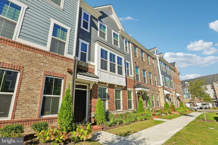 PRICE IMPROVEMENT + BUILDER WARRANTY!    Up to $5,000 LENDER Credit!

MUST SEE INSIDE!!  Prepare to be DAZZLED by this beautifully upgraded, like-new townhome in sought-after Greenleigh at Crossroads. Offering nearly every builder upgrade available, this home blends luxury, comfort, and thoughtful design across all three levels.

Step inside to SOARING CEILINGS, RICH WOOD staircases, RECESSED LIGHTING, LUXURY vinyl plank flooring, PLUSH carpet, and ELEGANT CERAMIC TILE throughout.

A KITCHEN THAT TRULY STEALS THE SHOW!!
The heart of the home is the STUNNING CHEF'S KITCHEN featuring:
    •    6-burner natural gas range
    •    Stainless steel appliances
    •    Custom tile backsplash
    •    Expansive granite island
    •    Tall, crisp white cabinetry with abundant storage
The OPEN-CONCEPT layout seamlessly connects the kitchen, dining, and living areas—creating the perfect setting for everyday living and effortless entertaining.

THE BALCONY UPGRADE YOU WON'T FIND ANYWHERE ELSE: 
Through a DOUBLE SET OF SLIDING GLASS DOORS, discover one of the home’s most exceptional features: a private balcony retreat anchored by a DRAMATIC FLOOR-TO-CEILING STONE FIREPLACE. Complete with CEILING FAN, TV WIRING, and CUSTOMIZABLE FLAME COLORS, this outdoor living space offers year-round enjoyment. Sip your morning coffee, unwind with a glass of wine, or relax while taking in PEACEFUL PARK VIEWS and SPECTACULAR SUNSETS.

Natural light pours into the living room through a triple front window, and the entire main level is painted in a neutral palette ready to complement any style. A conveniently located powder room completes this floor.

UPPER LEVEL COMFORT & PRIVACY
The upper level features three bedrooms, two full bathrooms, and a LAUNDRY closet for ultimate convenience.
The spacious owner’s suite occupies the rear of the home, offering peace and privacy. The SPA-LIKE primary bath includes:
    •    Frameless glass walk-in shower
    •    Dual shower heads
    •    Built-in shelving
    •    Roman bench
    •    Dual vanities
    •    Ceramic tile flooring
Two generously sized front bedrooms feature plush carpeting and ample closet space. One showcases beautiful wainscoting and designer paint. A full hall bath with dual sinks and a tub-shower combination makes shared routines easy.

VERSATILE LOWER LEVEL
The entry level offers interior access from both the front door and attached garage. A BUILT-IN WELCOME STATION adds organization, while a LUXURIOUS FULL BATHROOM with walk-in shower enhances flexibility.
A CARPETED FLEX ROOM provides endless possibilities—home office, playroom, gym, media room, or guest space.
GARAGE & PARKING
You'll quickly develop "garage envy" in the TWO-CAR ATTACHED GARAGE features soaring ceilings, EV CHARGING capability, and houses the TANKLESS water heater, sump pump, HVAC, and electric panel. The UNPRECEDENTED HEIGHT allows for potential additional storage build-out.
Enjoy PARKING FOR 4 vehicles total with a two-car garage plus driveway.

COMMUNITY AMENITIES
Greenleigh at Crossroads offers a clean, quiet setting near PARKS and WALKING TRAILS, along with impressive amenities:
    •    Large resort-style pool
    •    Kiddie pool
    •    Clubhouse
    •    Gym
    •    Yoga room
    •    Conference center with kitchen
    •    Dining, shopping, and professional services within the community
Convenient to local and major travel routes, this home truly offers the lifestyle you’ve been waiting for.

AVAILABLE & TURNKEY NOW. Information packets on signpost. Schedule your showing today!