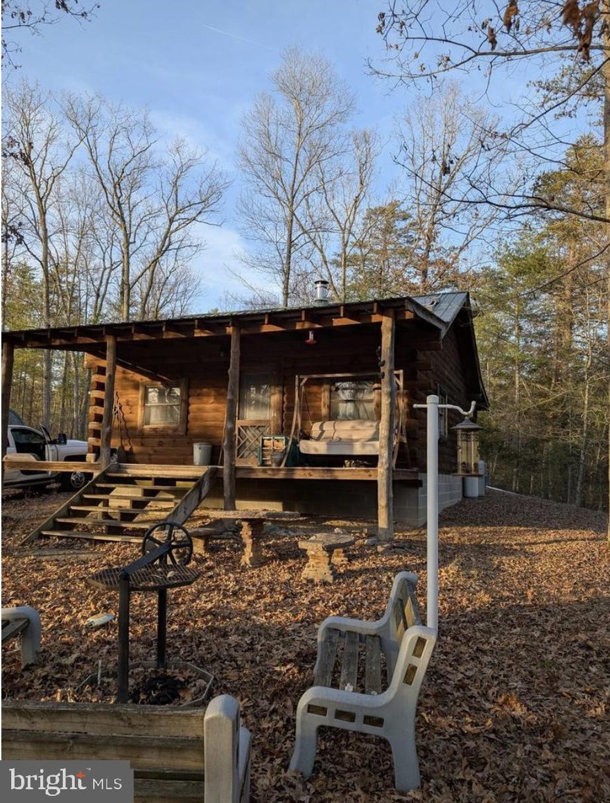 Escape to your private oasis with this charming off grid huntingcabin, nestled on 32.28 acres of pristine woodland bordering the national forest. This one bedroom, one bath retreat is a perfect weekend getaway or a hunter’s paradise. Situated behind a locked gate, you are ensuring the ultimate in privacy and tranquility. The cabin is powered by solar and propane for a sustainable and independent lifestyle with over 32 acres of wooded beauty. It is ideal for exploring hunting or simply enjoying nature. This property offers the perfect combination of seclusion and adventure making it an excellent choice for outdoor enthusiast or anyone seeking a peaceful retreat.