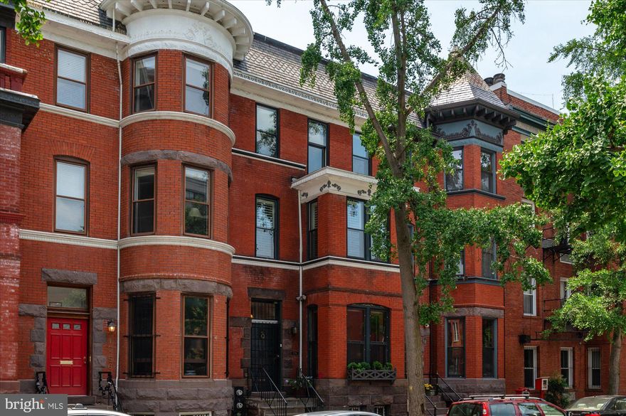 150K price reduction!  Welcome home to this Dupont Circle Grande Dame on one of the city’s favorite streets! This beautiful Victorian features spectacular original details and contemporary finishes. With four levels and over 3000 square feet, prepare to be charmed by four bedrooms, four and a half baths, two lovely decks, a garden, dedicated parking AND BONUS a large lower level that comes with a Certificate of Occupancy.  There is an additional family room on the top level that leads to a spacious top floor deck with gorgeous views of DC.  This home built circa 1900 isn't just for chic city living, it offers a tremendous amount of 125 year old architectural razzle dazzle:  Seven ornamental and working fireplaces, many with Eastlake influences and original tiles, a 6 foot foyer mirror, 10 ft. plus ceilings with crown moldings, pocket doors, a grand staircase complemented by stick and ball fretwork and ornately carved newel posts, original brass hardware and the list goes on.  The Stately Lady on Swann Street is the hostess offering all: fab location, historical soul, and easy contemporary livability!