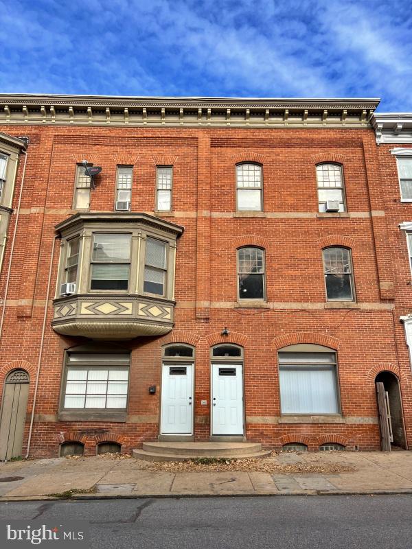 Third floor one bedroom with living room, kitchen with stove and refrigerator, and bathroom with stall shower. No pets and no smoking indoors.