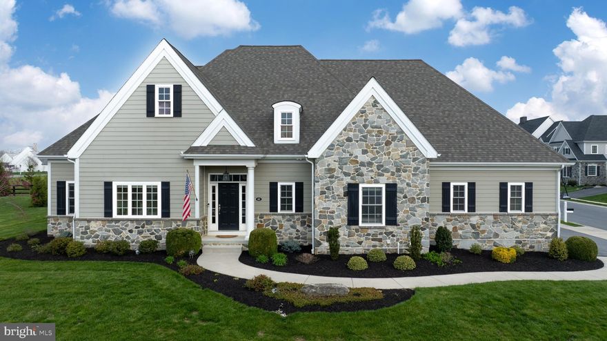 Easy first floor living in this lovely three-bedroom rancher custom built by Costello Builders. Located on a cul de sac in Stonehenge Reserve, the community is minutes to Bent Creek Country Club and close to downtown Lititz, Lancaster City, shopping, dining, and more. Appreciate all the fine features, including higher ceilings, gleaming hardwood floors, and crown molding with cove lighting. The great room opens to the kitchen and dining room and includes a warm fireplace. The kitchen offers custom cabinets, a breakfast island, and a pantry with built-in shelves. The primary bedroom includes a large walk-in closet and private bath with jetted tub, double sinks, and walk-in tiled shower. A full basement provides plenty of extra storage or finish out for more living space. Enjoy the warmer months with a nice, screened porch and patio. Completing the home is a three-car garage with an epoxied floor and a work sink. With an accented stone front, the home has great curb appeal. This Manheim Township gem has everything that you need! Call today for a tour.