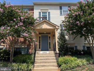Photo of 12002 Golf Ridge Court #102, FAIRFAX, VA 22033 (MLS # VAFX2331952)