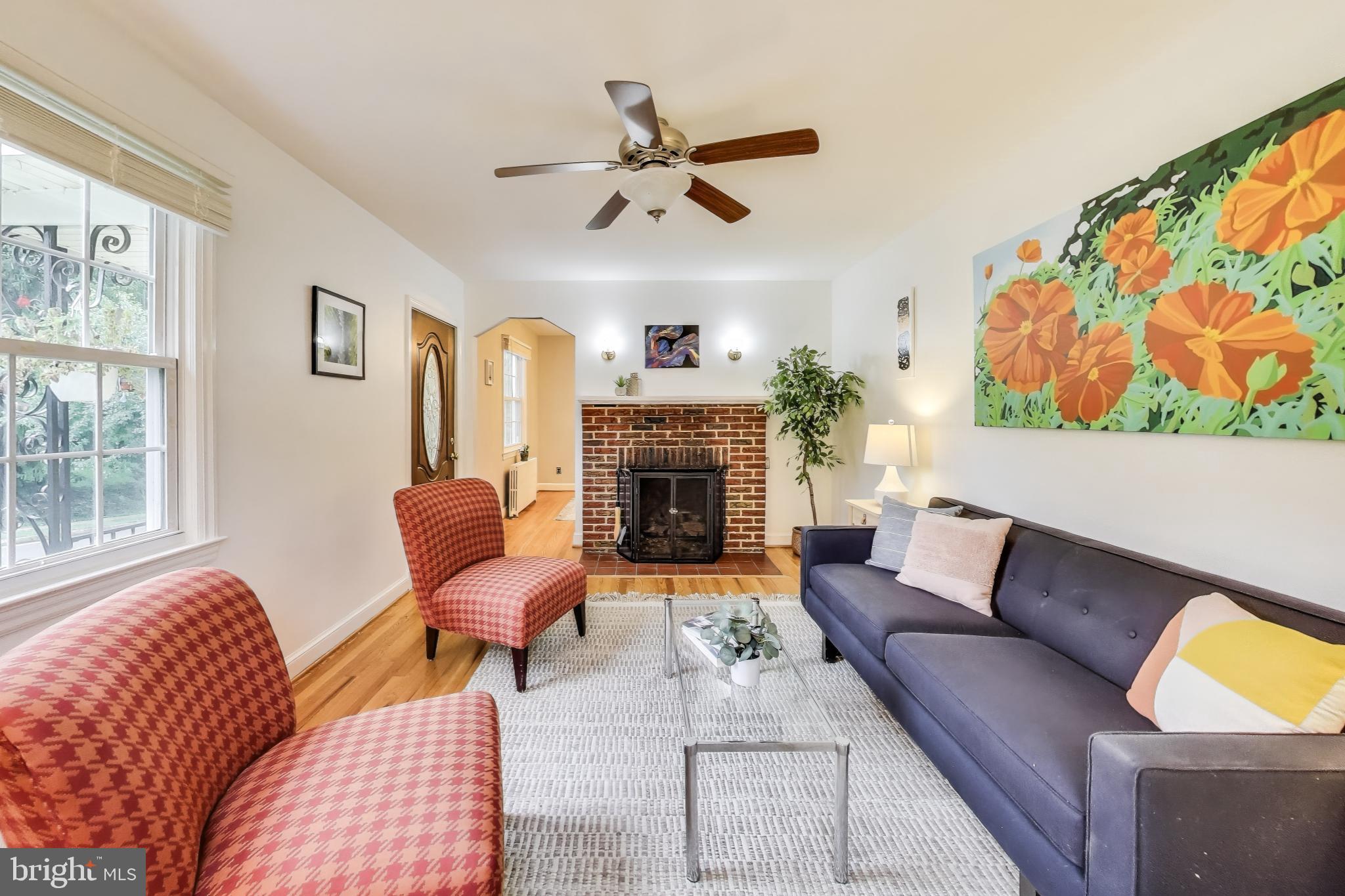 OPEN HOUSE SAT 8/16 & SUN 8/17 1-3PM! Welcome to this wonderful home in the charming community of Mount Rainier. This home has been well cared for with a new roof, windows replaced with energy efficient dual-pane sashes, custom window blinds, and refinished hardwood floors. The main floor features two generous bedrooms and a full bath with a large living room, dining room and kitchen that has an open pantry area and breakfast nook. The basement has its own walk-out entrance to a covered patio. There is also a large recreation room with a bar, a full bathroom, storage cupboards, and potentially a third bedroom off the laundry room. The full-length attic accessible by stairs provides ample storage space for those rarely used items or it could be converted to a large bonus room, kids playroom, or another bedroom. With a fully fenced corner lot and a one-car detached garage, this lovely home has so much potential to be the home that you love. It is less than one mile from the West Hyattsville Metro Station, and less than two miles from GLUT coop and the Mount Rainier downtown business district with easy access to Rhode Island Avenue, Eastern Avenue, Queens Chapel Road, and Chillum Road. Staging features the artwork of local artists.