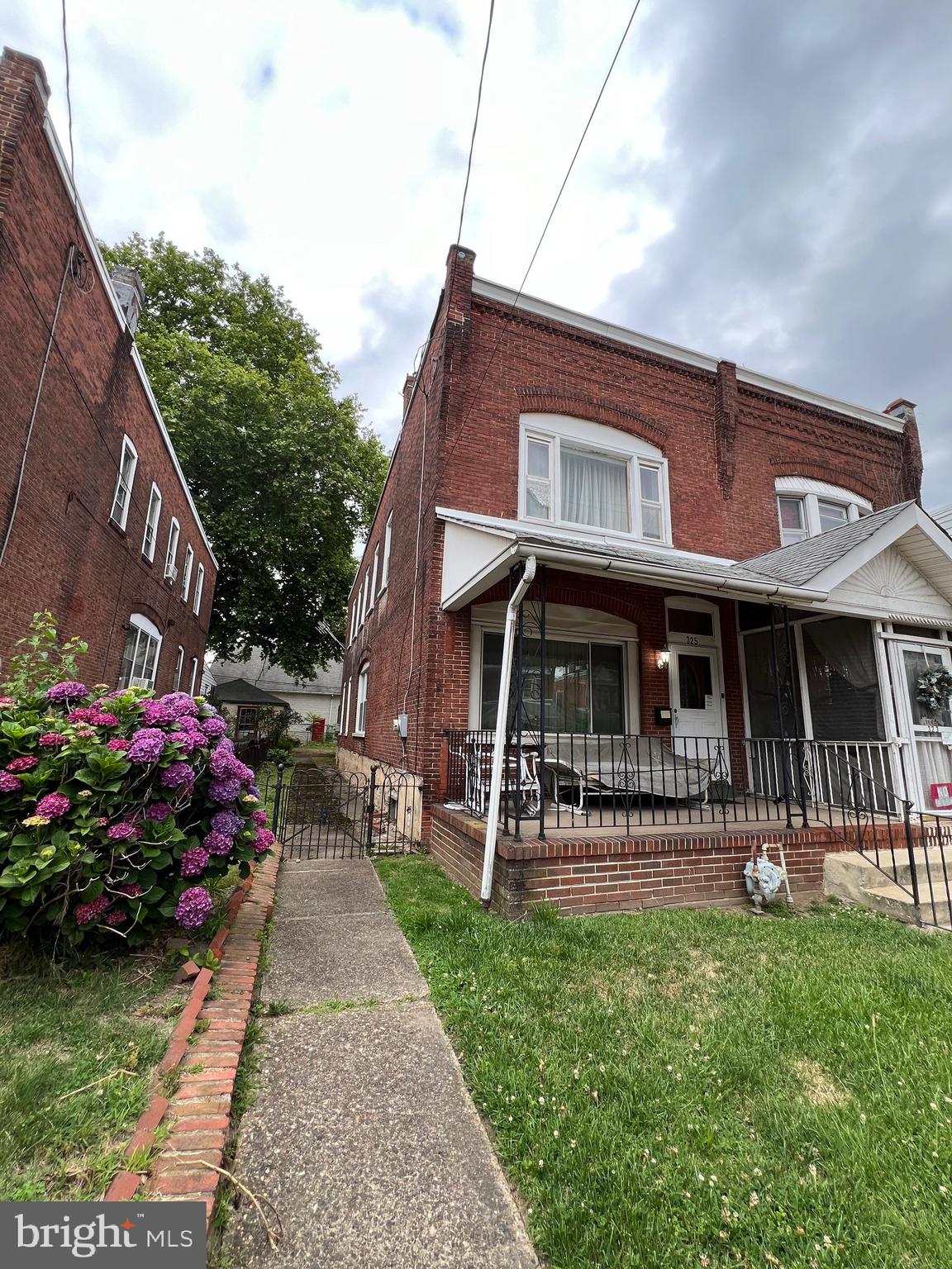 Come buy this great  investment opportunity over 1800 sq ft twin home located on a community block.
This Estate property  consists of an open porch,  sitting room/living rm combo, formal dining rm, eat in kitchen w/ powder/laundry rm combo with access to a spacious rear yard. The upper level is accessible from dual staircases, There is 3 ample size bedrooms w/ a bonus room which can be used as a play  room. The upper level also has a full bathrm w/ vanity, tub w/ shower, and newer tiolet. The unfinished basement  is large and consist of a gas Trane forced air house heater & water heater which was recently installed