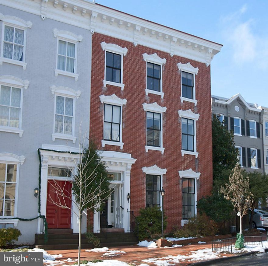 THOUGHTFUL RENOVATION OF HANDSOME CA 1866 SEMI DETACHED EAST VILLAGE HOME INTRODUCED BY HANDSOME BRICK FACADE, GRACIOUS AND GENEROUS ENTRY HALL, WITH 2-3 CAR PARKING AND "SIP AND DIP" POOL AS WELL AS LARGE TERRACE, 12' CEILINGS, 4 WOOD-BURNING FIREPLACES WITH ORIGINAL MARBLE MANTLES.  GOURMET EAT-IN KITCHEN WITH BREAKFAST BANQUETTE AND ADJACENT FAMILY ROOM, MUDROOM (REAR ENTRANCE) WITH CUBBIES, LAUNDRY, EXTRA FRIDGE. PEACEFUL PRIMARY SUITE WITH LUXE MARBLE EN SUITE BATH.