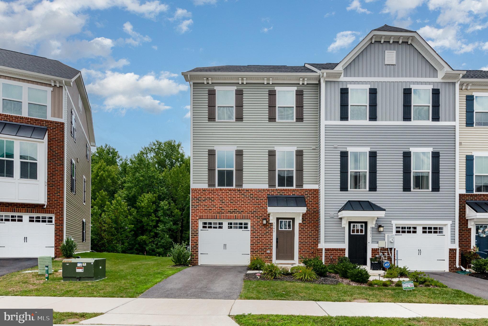 **Price Improvement** Discover the charm of this beautifully designed end-of-group townhouse in the desirable James Run Townhomes Community. Built in 2022, this residence offers a perfect blend of modern comfort and classic craftsmanship, featuring a warm Craftsman Architectural Style. Step inside to find an inviting open floor plan that seamlessly connects the living, dining, and kitchen areas, ideal for both entertaining and everyday living. The gourmet kitchen boasts upgraded quartz countertops & cabinets, stainless steel appliances, and a spacious island, making meal prep a delight. Enjoy cozy breakfasts in the dedicated breakfast area with door to deck. With three generous bedrooms, including a primary suite with a luxurious bathroom featuring a stall shower, this home caters to your relaxation needs. The walk-in closets provide ample storage, while ceiling fans and plush carpeting add to the comfort throughout. The improved walkout basement offers additional living space and easy access to the outdoors, perfect for gatherings or quiet evenings. Step outside to your deck, where you can unwind and enjoy the serene views of the trees and woods that back the property. The attached garage and driveway provide convenient parking, while the community amenities, including a clubhouse and exercise room, enhance your lifestyle. Experience the perfect blend of comfort, style, and community in this lovely home. Be the beneficiary of lower electric bills with the owned solar panels. "Special Financing Incentives available on this property from SIRVA Mortgage"