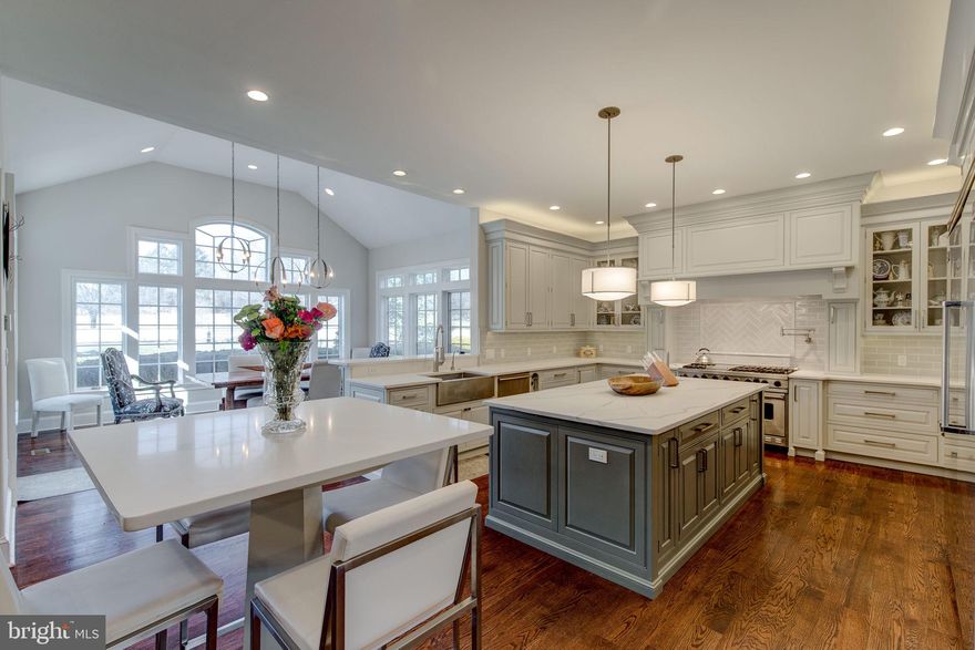 Aggressive price reduction just taken. Motivated sellers can accommodate a 30 settlement on this
grand, gorgeous and strategically located home in the heart of historic Gwynedd Valley. It boasts ease of access to all major roadways, the train, corporate centers, hospitals, schools, shopping, sports facilities, houses of worship and entertainment. In 2006 a modest farm house was redesigned and expanded to become this 9,000 square foot home of distinction featuring a sweeping two story foyer, grand mahogany staircase with forged iron railings, wainscoting and exquisite attention to detail.  Boasting 6 oversized bedrooms, 7 full and 1 half bath and large laundry rooms on both the upper and main floors.  Three gracious stories of generously-proportioned living space including a high finish lower level.  
This home experience begins in the spacious owner’s suite where you can relax and unwind in a sitting room by the custom stone-crafted fireplace.  Two spacious walk-in closets and a dressing area provide for all your wardrobe needs.  Luxuriate in a wonderful light marble spa-like main bathroom. The main bedroom features large windows and French doors leading to a balcony that overlooks the beautiful manicured grounds. 
In 2018 the Rothman Designs Company undertook the task of creating and overseeing a whole house refresh. As part of this program all new dark walnut hardwood flooring was installed on the main level of the home and continues throughout the hallways into the main suite. Modern grey laminate wood flooring was installed on the lower level.  A neutral paint palate provided a light and bright ambiance throughout.  The gourmet kitchen was meticulously updated with custom pale-grey hardwood cabinetry, brushed stainless hardware and fixtures with new white veined quartz counter tops and a new backsplash.  Amenities include a Viking range with double ovens, Subzero full-size refrigeration and freezing, two dish washers, r/o hot and cold filtration, a built-in Viking  microwave and a champagne sink in the island counter. Exquisite new custom Hubbarton Forge light scaping was installed in the kitchen and conservatory that gave this area real panache.  There is an oversized walk-in pantry adjacent to the kitchen. The butler’s pantry with handsome cabinetry was also updated with gleaming new pearl stone counter tops, a hand hammered silver bar sink that flaunts Waterford crystal fixtures; a new Scotsman icemaker, wine and beverage refrigerator were also installed.  The casual open space between the kitchen, breakfast area and conservatory culminate in a true great room with volume and height finished completed a two-story stone wood burning fireplace and rich plantation shutters. Professional office needs are fulfilled by a private and stately study.   
The accommodating formal dining room is elegant, bright and expansive with a Retro crystal chandelier and sconces. Across the center hall your guests can retire to a chic living room that adjoins a billiard room with a carved stone fireplace.  A powder room services this area of the home.  Gallery style wall space and soft natural lighting provide are ideal for art installations.  
As if this Grand Manor Home was not enough it also provides for the ultimate in outdoor entertainment space.  Surrounded by mature landscaping, enjoy the fabulous inground pool and spa with pool house, play pickle ball, tennis or basketball on your lighted sports court.  Cook and dine poolside or catch a quiet moment in the quaint Gazebo.  Equestrians should note that this property is zoned for up to four horses.
There is a cabana area in the rear of the home with a full bath, laundry and a mud room with wall-to-wall closeting. This is area can also be accessed from the four-car attached garage.  Discover a full exercise room, recreation room with gas fireplace, full bar area with custom cabinetry, stone counters, bar and lounge seating and an adjacent full bath.  FEATURED IN JULY ISSUE OF AD!