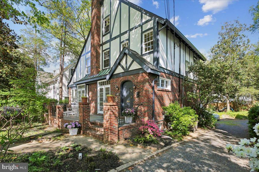 ****Open Sat & Sun (April 25th/ 26th), 2-4pm!****

A truly exceptional, quintessential residence gracefully set along one of the area’s most scenic, tree-lined lanes, surrounded by lush, curated landscaping and distinguished architectural character. The home features beautifully proportioned, light-filled interiors spanning four finished levels, thoughtfully designed for both elegant entertaining and comfortable everyday living.
The main level offers a seamless blend of sophistication and warmth, including a gracious formal dining room, a stunning living room with a wood-burning fireplace and French doors that open to an expansive, tiled front porch, and a private office framed by windows on three sides. An enchanting balcony/porch extends the dining room's living space for outdoor enjoyment before gathering around the table! 

Upstairs, an impressive fourth-floor retreat with soaring ceilings provides exceptional flexibility—ideal for an additional home office, playroom, or guest suite.  A serene primary suite with a private en-suite bath, complemented by two generously sized secondary bedrooms and a well-appointed full bath, completes the second level. 

The walk-out, expansive lower level with two sets of new French doors opens onto a flagstone patio and a professionally landscaped garden, creating a tranquil setting for outdoor enjoyment. 

Ideally situated near the Capital Crescent Trail, Lawton Community Center, and Elm Street Park, this home is part of a welcoming community known for its tree-lined streets and easy, everyday livability. Neighbors enjoy morning walks and bike rides, nearby parks and green spaces, and the convenience of local dining and shopping just moments away in Downtown Bethesda.

Located in the Town of Chevy Chase, known for its exceptional services for its residents, this home offers a wonderful balance of neighborhood charm and accessibility. Enjoy convenient access to downtown Washington, DC, the Capital Beltway, Interstate 95, and major airports. A timeless property ready to be enjoyed by its next owner.

Note: The Lower level bedroom doorway & closet are not installed (it is set up for it with for full egress).  The space has been left open depending on the desired floor plan