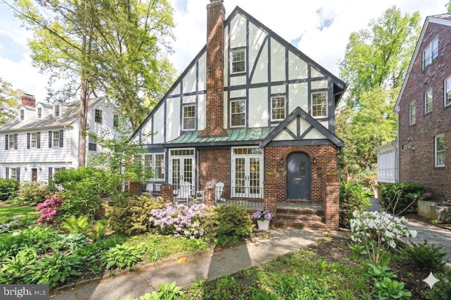****Open Sat & Sun (April 25th/ 26th), 2-4pm!****

A truly exceptional, quintessential residence gracefully set along one of the area’s most scenic, tree-lined lanes, surrounded by lush, curated landscaping and distinguished architectural character. The home features beautifully proportioned, light-filled interiors spanning four finished levels, thoughtfully designed for both elegant entertaining and comfortable everyday living.
The main level offers a seamless blend of sophistication and warmth, including a gracious formal dining room, a stunning living room with a wood-burning fireplace and French doors that open to an expansive, tiled front porch, and a private office framed by windows on three sides. An enchanting balcony/porch extends the dining room's living space for outdoor enjoyment before gathering around the table! 

Upstairs, an impressive fourth-floor retreat with soaring ceilings provides exceptional flexibility—ideal for an additional home office, playroom, or guest suite.  A serene primary suite with a private en-suite bath, complemented by two generously sized secondary bedrooms and a well-appointed full bath, completes the second level. 

The walk-out, expansive lower level with two sets of new French doors opens onto a flagstone patio and a professionally landscaped garden, creating a tranquil setting for outdoor enjoyment. 

Ideally situated near the Capital Crescent Trail, Lawton Community Center, and Elm Street Park, this home is part of a welcoming community known for its tree-lined streets and easy, everyday livability. Neighbors enjoy morning strolls and bike rides, nearby parks and green spaces, and the convenience of local dining and shopping just moments away in Downtown Bethesda.

Located in the Town of Chevy Chase, known for its exceptional services for its residents, this home offers a wonderful balance of neighborhood charm and accessibility. Enjoy convenient access to downtown Washington, DC, the Capital Beltway, Interstate 95, and major airports. A timeless property ready to be enjoyed by its next owner.

Note: The Lower level bedroom doorway & closet are not installed (it is set up for it with for full egress).  The space has been left open depending on the desired floor plan