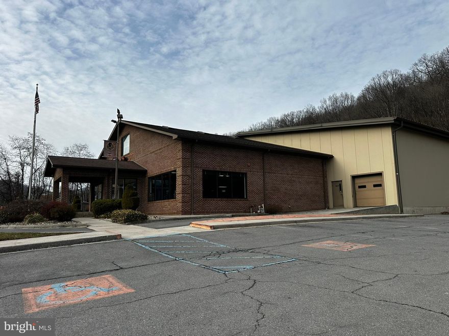 Built "New"  in 2001 on top of old Roy Rogers Foundation + Huge Metal Building - 6 zones heat and A/C all ADA improvements (per codes in 2001) Very well built and maintained. Large lot with 40+ parking spaces and "drive through" shop. Large storage and meeting rooms upstairs plus basement storage.

12,168 main level = 74 x 44 (brick) showroom/offices/restrooms, etc. 88 x 100 metal at rear + portico
4,432 SF upper level Storage/Meeting room/offices
Approx 3,000 sf basement for storage