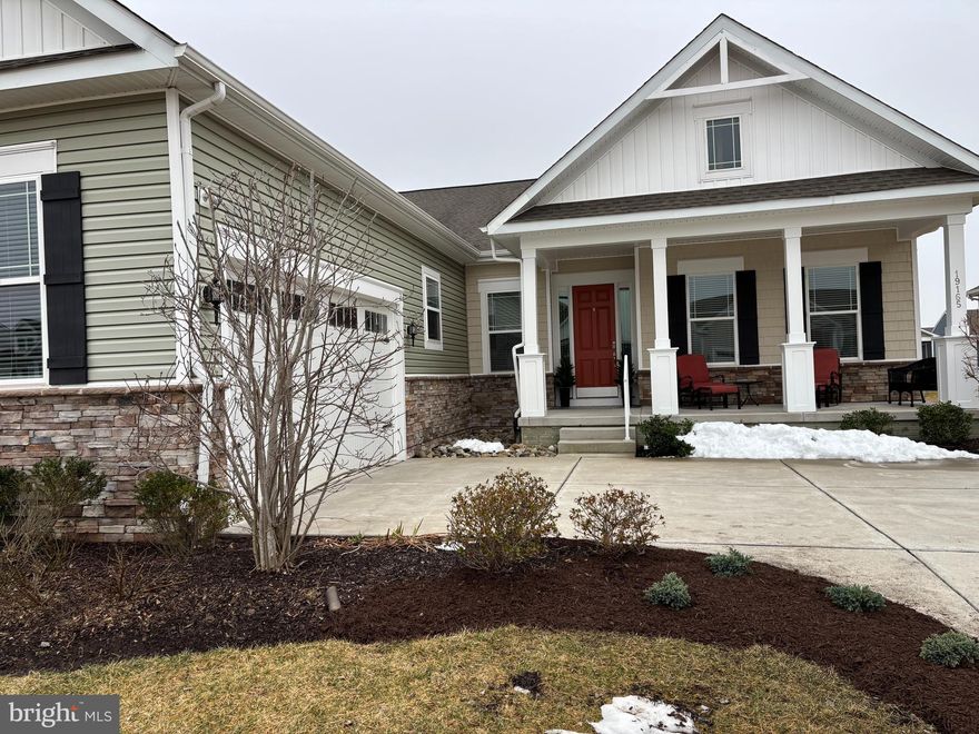 Located in the vibrant community of the Four Seasons at Belle Terre, this exquisite Craftsman-style residence is designed for those seeking a luxurious lifestyle. This Ravenna model was the builder's model home and was designed to show customers a sample of the possibilities for upgrades and options.  It also contains decorator items that were not available to purchase such as wallpaper, custom paint, window treatments, decorative trim, additional landscaping, interior and exterior accent lighting and built-in office cabinets.  It is one of only three Ravenna homes within the community and offers an interior side entry garage.  Step inside to discover a spacious open floor plan that seamlessly connects the gourmet kitchen, dining area, and family room, creating an inviting atmosphere for relaxation and entertaining. The kitchen is a chef's dream, featuring upgraded cabinets, quartz countertops, a large island, and ENERGY STAR appliances, including a double wall oven and built-in microwave. Beautiful engineered-hardwood floors flow throughout the entire home, complemented by crown moldings, tray ceilings and wainscoting. The primary suite is a true sanctuary, with a generous walk-in closet and an en-suite spa bathroom designed for ultimate comfort. Recessed lighting, a decorative chandelier and large windows fill the space with natural light, enhancing the ambiance. Additional bedrooms provide ample space for guests or hobbies, while a dedicated office with custom built cabinets offers versatility for your lifestyle needs. Outside, the full lawn irrigation system keeps the upgraded landscaping lush and inviting. The property features a charming full front porch with stone accents and a covered back porch perfect for sipping morning coffee. This home also includes practical features such as a full unfinished basement with double areaway walkout stairs, 3 piece bathroom rough-in and sliding glass doors, providing endless possibilities for customization.  The community amenities are second to none, including a sparkling outdoor pool, pickle ball and bocce ball courts, a well-equipped community center with instructor led classes, kayak storage and launch area and a wooded jog/walk path.  Experience the exclusive lifestyle that Four Seasons at Belle Terre offers, where luxury meets comfort in a vibrant community setting. This residence is not just a house; it's a place to call home, where every detail has been thoughtfully designed to enhance your living experience. Embrace the opportunity to create lasting memories in this exceptional property.