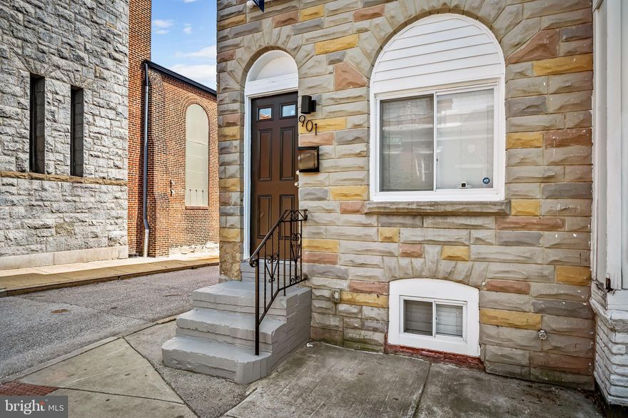 In the heart of Pigtown, directly across from shops and eateries and just a short walk to the stadiums, this home delivers the best of city living. Offering three bedrooms and three and a half baths, including two primary suites, the layout is as functional as it is inviting. A bright white kitchen with granite countertops and stainless steel appliances anchors the main level, complemented by hardwood floors, recessed lighting, and designer tile baths throughout. Recent updates include a roof replacement in August 2025, adding peace of mind. Off-street parking with easy access and a generously sized space provides a rare and valuable convenience in this dynamic setting.