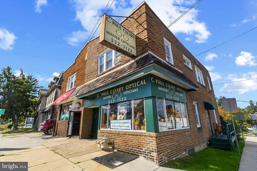 Excellent investment or owner-user opportunity in a highly visible corner location! Situated at the intersection of Chester Pike and Summit Avenue,  in the heart of Prospect Park.
The first floor features a well-maintained retail storefront, currently operating as an optical store, with large display windows, high visibility, and flexible interior space suitable for a variety of uses with potential rents up to $2000. The second floor includes a spacious two-bedroom apartment with a private entrance—ideal for owner occupancy or additional rental income.  The 2nd floor is currently rented for 
$1300 per month, on month to month rent.  This desirable property is equipped with its own private parking lot able to accommodate 3 cars.
This property sits on a corner lot.  Close to township parks, schools.  It’s conveniently located near public transportation, shopping, and major routes, making it easily accessible to Philadelphia, Delaware, New Jersey, and Philadelphia International Airport.  Each unit has separate utilities, adding convenience and flexibility for future use.
If you are an investor looking to grow your portfolio, 701 Chester Pike is a fantastic opportunity in Delaware County.