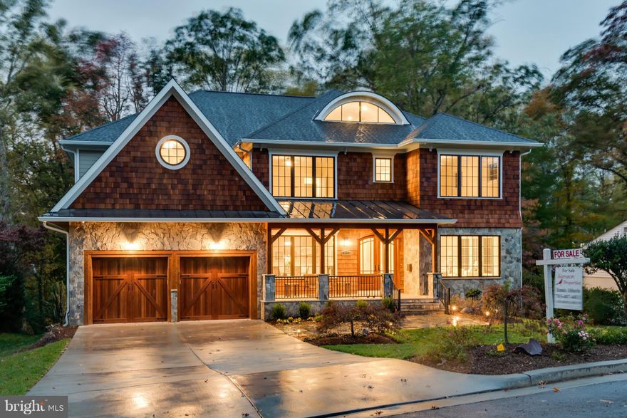 Luxury home ready to move in. In law/Au pair suite. 6 BRs, 7 full BAs, 1 half BAs. Spacious open floor design. 4 finished levels. Gourmet kitchen. Basement features full bar w/ wine cellar, fitness room, walk out to stone patio surrounded by trees. Master bedroom with fireplace, large walking closet, Butler's pantry, Hardwood on main and second floor, Security system with cameras,