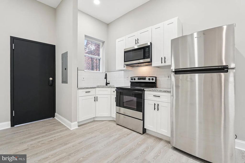 Photo of 916 N Arlington Ave #3, BALTIMORE, MD 21217 (MLS # MDBA2186740)