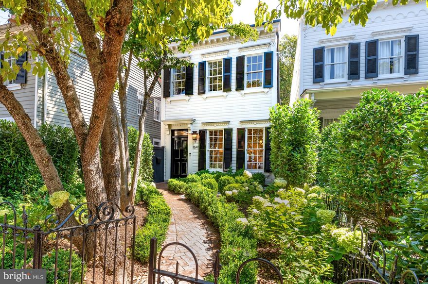 Akseizer Residential delivers a new level of grandeur with this impeccable property in Georgetown's West Village. 1641 35th St NW is elegantly chic with approximately 3,600 total interior sq.ft. encompassing a fully detached Main House with 4 Bedrooms and 3.5 Baths and a separate Carriage House. The Carriage House is two levels with a 1-Car Garage and a 1 Bedroom plus 1 Bath Upper-Level Guest Suite. With a complete designer renovation in 2022, 1641 35th St NW incorporates handcrafted custom millwork, timeless stone and tile selections, gleaming White Oak hardwood floors, and custom designer fixtures to curate a sensational experience as you explore each room. Situated on a deep, light-filled lot, this exquisite residence showcases beautifully landscaped front and rear gardens. The rear Garden is polished perfection delivering numerous experiences with a built-in BBQ grill and a secret garden lounge area with an outdoor TV. The Main Level features 10’ ceilings, and the Lower Level features 9’3” ceilings – incredible scale throughout!