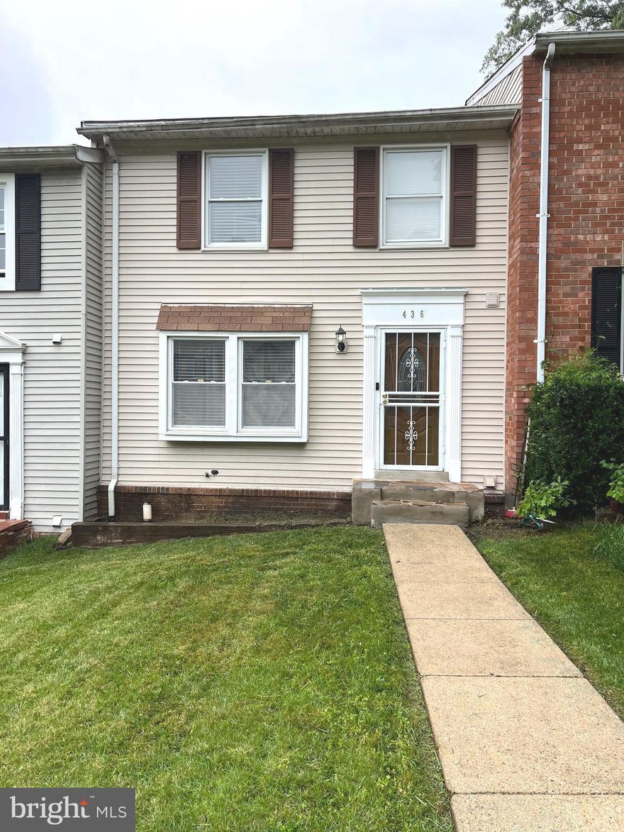 This lovely 3 bedroom 2.5 bath townhome has been updated with hardwood flooring on the main level. The kitchen has granite countertops, stainless steel appliances, and an eating bar that separates the kitchen from the dining area. The upper level has 3 nice-sized bedrooms and newly installed carpet. The lower level is equipped with a full bathroom, large storage space, and a wall-mounted fireplace that conveys.