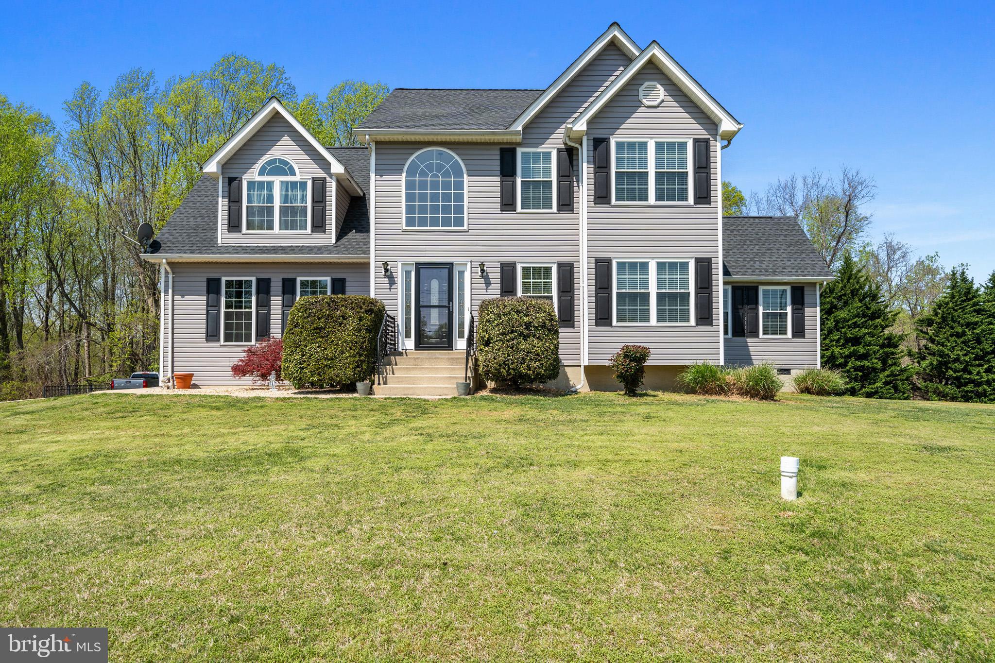 This well-loved and charming house, rebuilt in 2003, is move-in ready! Owners are taking away your worries and have made so many improvements so you can move right in! But before I tell you about that, if you're a person who takes to the road in your travel trailer or RV, there are TWO RV pads waiting for you on this lot! And one of them has 50-amp service and a line to empty your waste directly into your backyard septic system! Talk about creative and convenient! Whether you're storing your travel vehicles or others are visiting you in theirs, you'll have it all ready to go for them, too!
As for the home improvements, you'll be waking up each morning with a new roof over your head that was installed in 2022; 2023 - new propane Gas Heat & Glo fireplace and new siding; 2024 - upstairs HVAC and stainless Kitchen-Aid appliances; 2025 - kitchen vinyl flooring, new windows and living room carpet! Primary bedroom with en-suite bathroom boasts a cozy little reading nook and your washer/dryer just steps away on the top floor. All bedrooms are carpeted and have ceiling fans and are neutral in color. The living room has a gorgeous accent wall that ties into the tile work from the kitchen and breakfast nook. You'll have nothing but warm and cozy vibes from the moment you walk into the front door and settle into the living room. The unfinished basement is built from the original house foundation and approved/permitted in 2003 for the rebuild. The basement has a framed-in 5th bedroom that has a closet and a nice basement window next to the walkout backdoor. The 2-car garage insulated on the walls and the garage doors and there's plenty of turn-around space in this driveway!
Plum Point Elementary and Middle Schools are a stone's throw away and if you want the beach life, Breezy Point beach, North Beach and Chesapeake Beach communities/beaches are just 10 minutes away! Enjoy the sand, boardwalk, quaint beach shopping or an ice cream amid nature areas...convenient to recreation centers, libraries and within commuting distance to Pax River, Andrews AFB, Bolling AFB, DC and so many other areas!