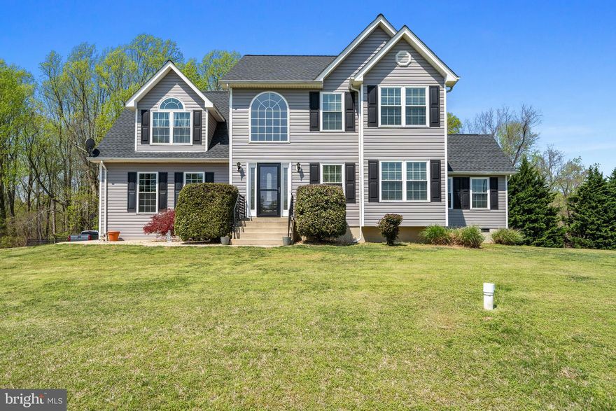 This well-loved and charming house, rebuilt in 2003, is move-in ready! Owners are taking away your worries and have made so many improvements so you can move right in! But before I tell you about that, if you're a person who takes to the road in your travel trailer or RV, there are TWO RV pads waiting for you on this lot! And one of them has 50-amp service and a line to empty your waste directly into your backyard septic system! Talk about creative and convenient! Whether you're storing your travel vehicles or others are visiting you in theirs, you'll have it all ready to go for them, too! 

As for the home improvements, you'll be waking up each morning with a new roof over your head that was installed in 2022; 2023 - new propane Gas Heat & Glo fireplace and new siding; 2024 - upstairs HVAC and stainless Kitchen-Aid appliances; 2025 - kitchen vinyl flooring, new windows and living room carpet! Primary bedroom with en-suite bathroom boasts a cozy little reading nook and your washer/dryer just steps away on the top floor. All bedrooms are carpeted and have ceiling fans and are neutral in color. The living room has a gorgeous accent wall that ties into the tile work from the kitchen and breakfast nook. You'll have nothing but warm and cozy vibes from the moment you walk into the front door and settle into the living room. The unfinished basement is built from the original house foundation and approved/permitted in 2003 for the rebuild. The basement has a framed-in 5th bedroom that has a closet and a nice basement window next to the walkout backdoor. The 2-car garage insulated on the walls and the garage doors and there's plenty of turn-around space in this driveway!

Plum Point Elementary and Middle Schools are a stone's throw away and if you want the beach life, Breezy Point beach, North Beach and Chesapeake Beach communities/beaches are just 10 minutes away! Enjoy the sand, boardwalk, quaint beach shopping or an ice cream amid nature areas...convenient to recreation centers, libraries and within commuting distance to Pax River, Andrews AFB, Bolling AFB, DC and so many other areas!