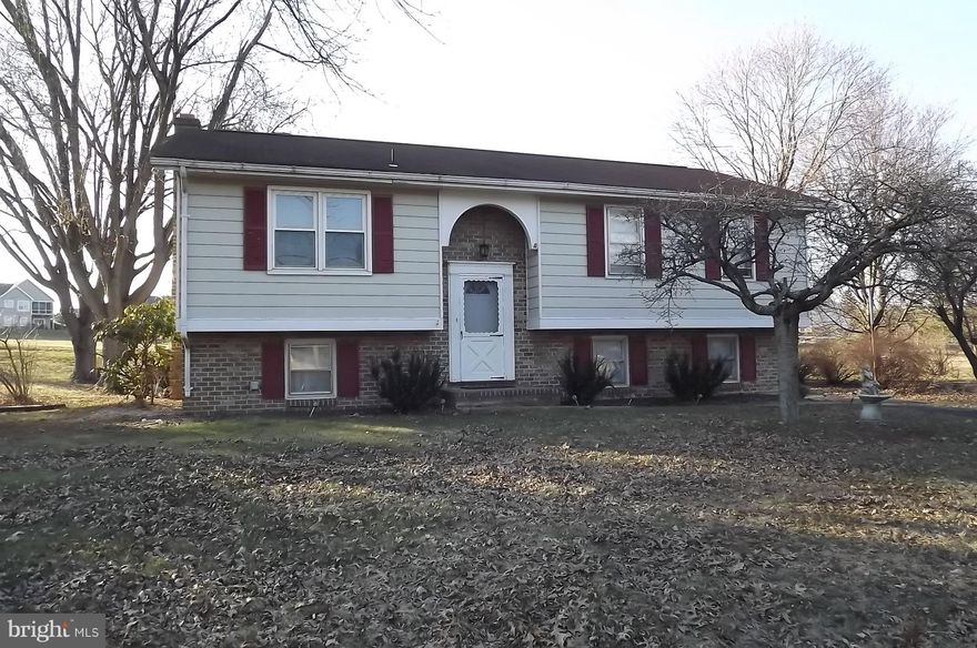 Penn National Estates!  Penn National golf course across the street, large, level fenced rear yard, finished lower level with FP, wood floors, rear deck, screened-in porch & MORE!  Needs some TLC!  But worth taking a look!  Outstanding opportunity to own your own home or for investment property!