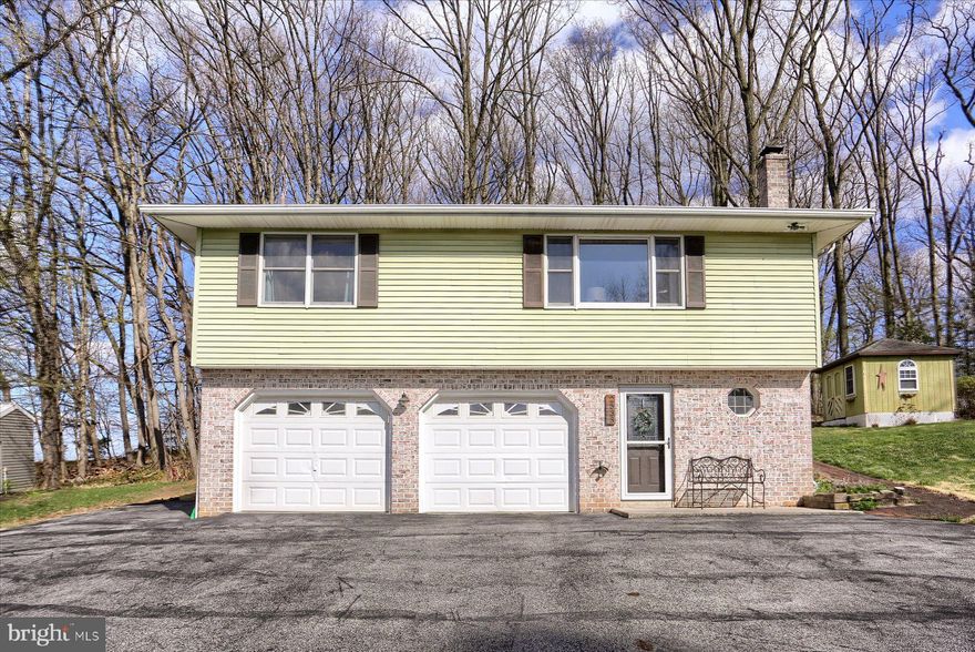 Welcome to this charming 2-bedroom, 2-bath raised ranch located in a serene and private setting at the end of a quiet street in Upper Allen Township. Situated on just under half an acre, this home offers both tranquility and convenience within the sought-after Mechanicsburg School District. The lower level features a cozy den complete with a propane stove, perfect for relaxing or entertaining. You’ll also find a full bath and laundry area on this level. Upstairs, enjoy an open floor plan with a spacious family room, a well-appointed kitchen with eat-in dining, and picturesque views of your private backyard. Two comfortable bedrooms and a full bath complete the main floor. One of the home's standout features is the sunroom, with windows all around, offering the perfect spot to relax and watch the seasons change. Step outside to your very own oasis with an in-ground pool and pool shed, ideal for summer fun and relaxation. The home also boasts a 2-car heated garage, providing plenty of space and comfort. With mature trees surrounding the property and a prime location, this home offers both peace and proximity to all the conveniences you need. Don’t miss out on this incredible opportunity! Schedule your showing today!