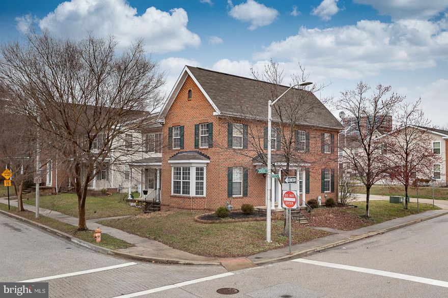 Heritage Crossing is one of Baltimore’s Hidden Gems with its own park... Perkins Square and Gazebo.  This Home is located on a corner lot directly across from the park which has a walking path, benches, and a historic Gazebo.  The Home has a modern floorplan with remodeled kitchen, bathrooms, flooring and more.  Open living/dining room.  Spacious bedrooms.  Primary bedroom has walk-in closet and en suite bathroom.  Lower level has a large utility room with washer and dryer, and an open floorplan for several use options: office, recreation, entertainment, workout area, whatever you desire.  Private parking pad and plenty of on-street parking.  This is a rare opportunity, and a good location with access to downtown areas.  Commuters will appreciate the proximity to major highways and public transportation, making travel a breeze.  Convenient distance to Bromo Arts District, Walters Art Gallery, Arena Players, Lexington Market, and UMMC.