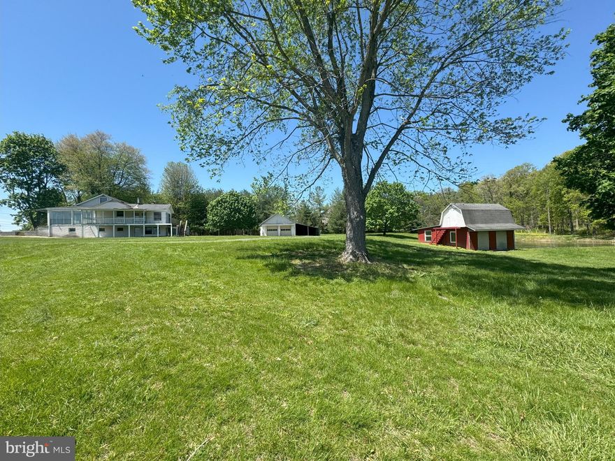 Great opportunity to create sweat equity! Priced for the value of the lot only.  4.4 beautiful acres with a pond, two car detached garage and storage barn.  The home needs some TLC to bring it back to it's glory. Being sold as-is. No sign on the property.