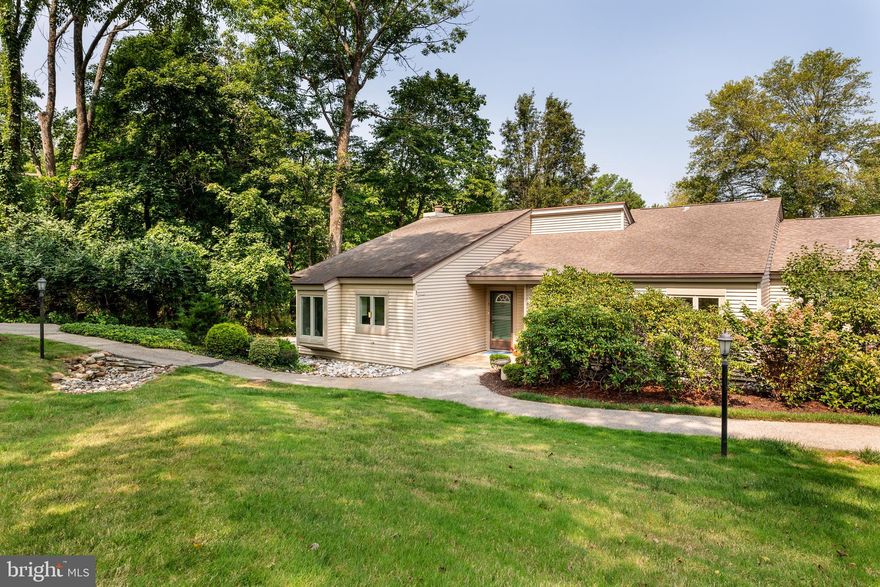 Welcome to this beautifully updated end unit townhome in the serene Hershey's Mill community, with amenities that include a Community Center, library, pool, tennis and pickleball courts, wood shop, and walking trails. This home offers a perfect blend of modern upgrades and tranquil surroundings, including a picturesque view of a pond, freshly painted interior, luxury vinyl plank flooring, and a new electrical box. Enjoy the cozy ambiance of an electric fireplace in the sunny living room with access to the screened-in porch where you can unwind while taking in the peaceful pond view. Through the dining room you will find a renovated kitchen with new appliances, breakfast area, and laundry closet. The primary bedroom suite features an updated en-suite bathroom and a walk-in closet. Two additional bedrooms and an updated hall bathroom complete the home. Utilize the detached one-car carport for parking. With its prime location, this home provides easy access to the community center, pool and more amenities! Golf course membership is available for an additional fee.